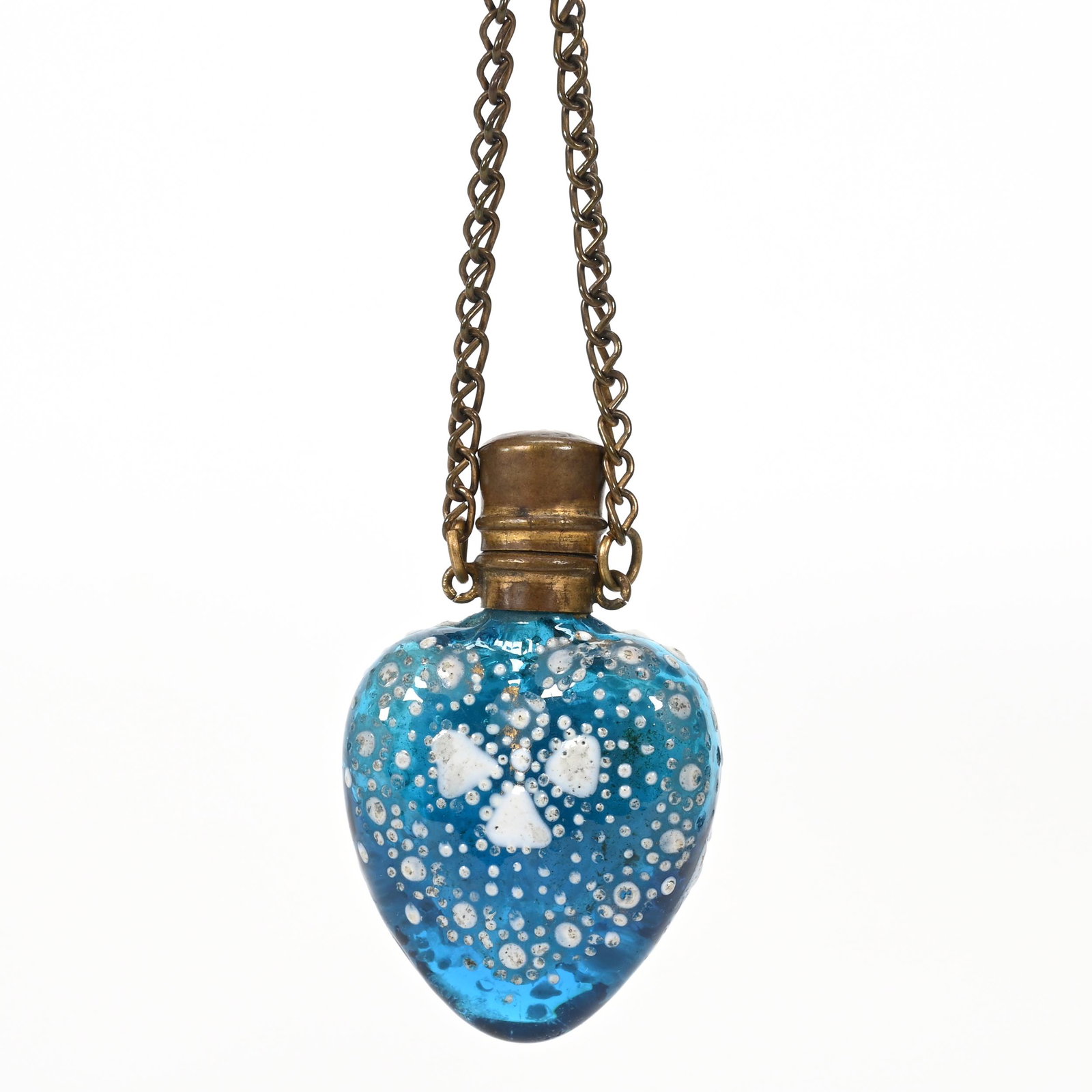Locket Perfume, Blue Bohemian Art Glass: Locket Perfume, Blue Bohemian Art Glass, 1.75" x 1.25", Heart Shaped, White Enamel Floral Decor, Gilt Metal Fittings, Don Henson Estate, Michigan. Part 3. This auction is the final dispersal of a coll