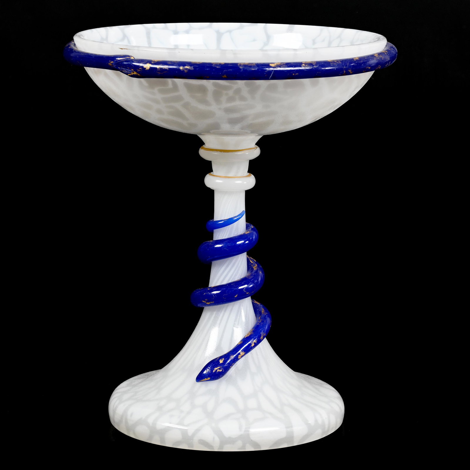 Compote, Cased White Mottled Art Glass: Compote, Cased White Mottled Art Glass, 10.25" x 8.5", Blue Applied Snakes Coiled Around Stem And Rim, Some Gold Stencil Highlights, Don Henson Estate, Michigan. Part 3. This auction is the final disp