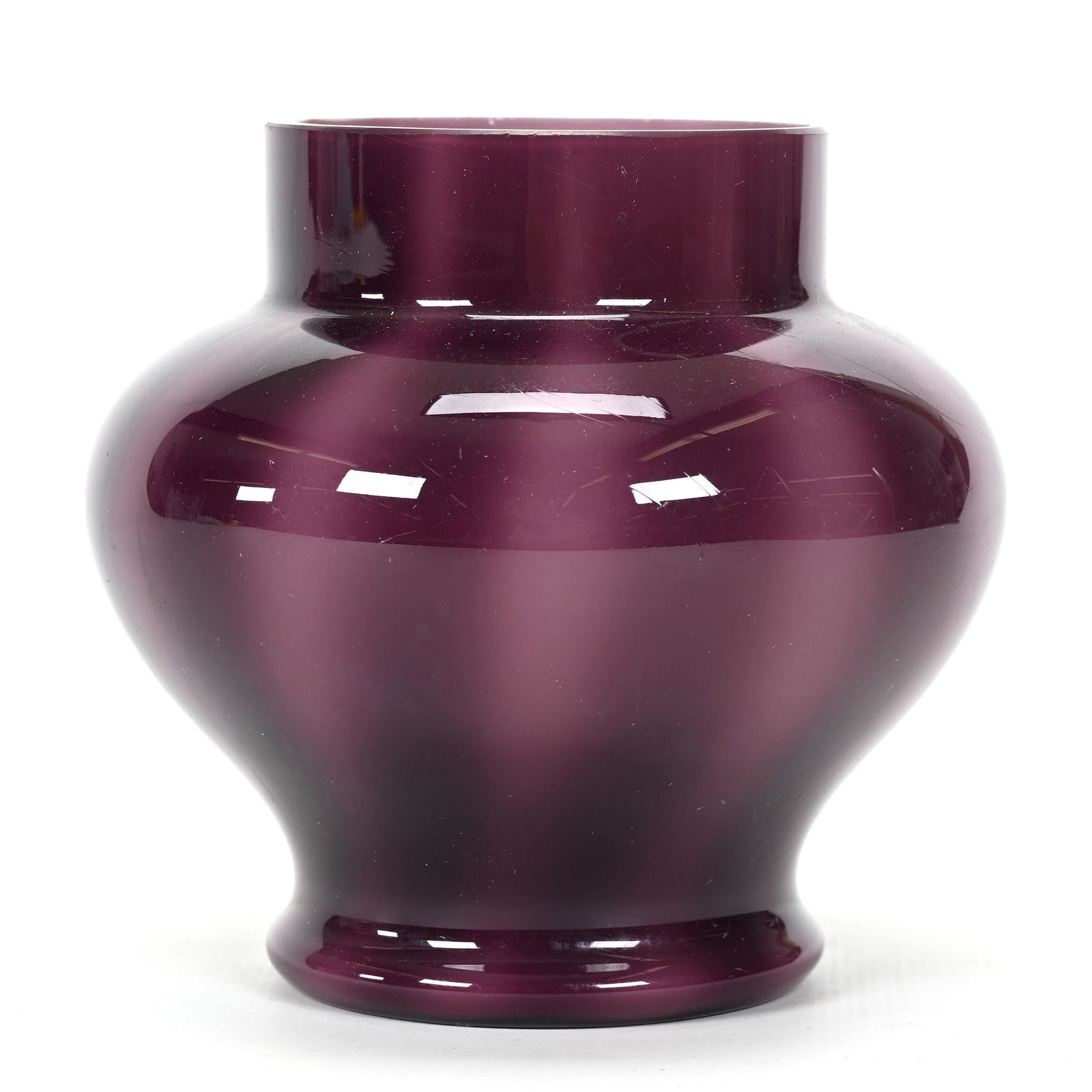 Vase, Cased Art Glass: Vase, Cased Art Glass, 4" x 4", Resembles Plum Jade By Steuben, We Do Not Believe This Item Is By Steuben But Coloration Is Very Similar, Don Henson Estate, Michigan. Part 3. This auction is the final
