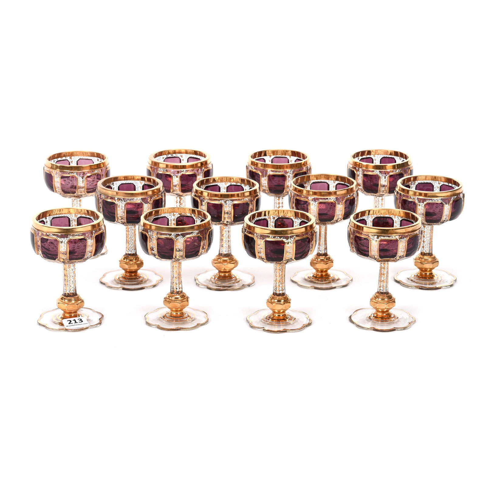 (12) Wine Stems, Clear Bohemian Art Glass: (12) Wine Stems, Clear Bohemian Art Glass, 4" x 2.75", Eight Amethyst Panel Cut Sections, Extensive Gold Stencil Highlights, Attributed To Moser, Matches Lot #212 & #214, Don Henson Estate, Michigan. 
