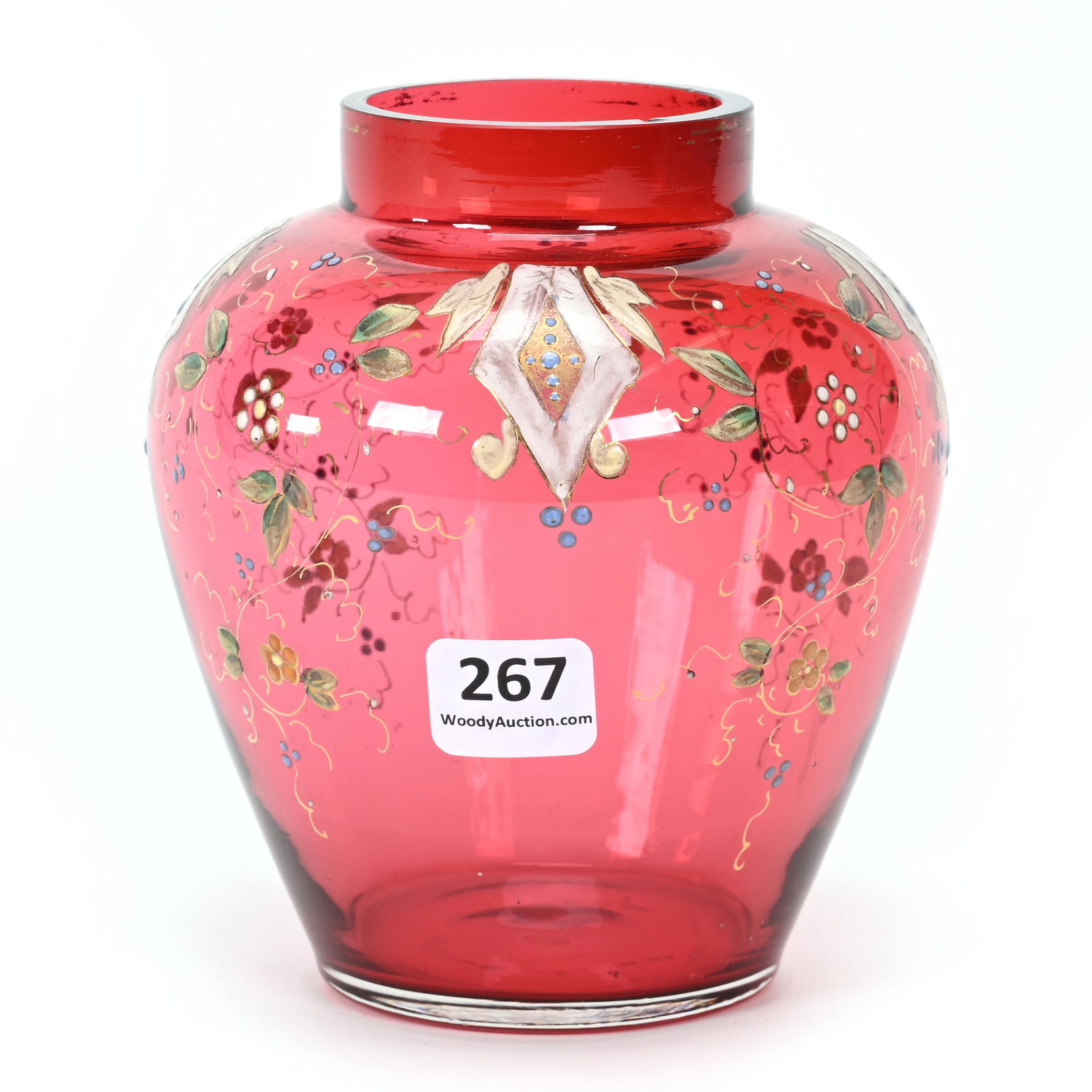 Vase, Cased Cranberry Bohemian Art Glass: Vase, Cased Cranberry Bohemian Art Glass, 5" x 4.25", Enamel Floral Decor, Small Rim Nick, Don Henson Estate, Michigan. Part 3. This auction is the final dispersal of a collection of over 1,700 items 