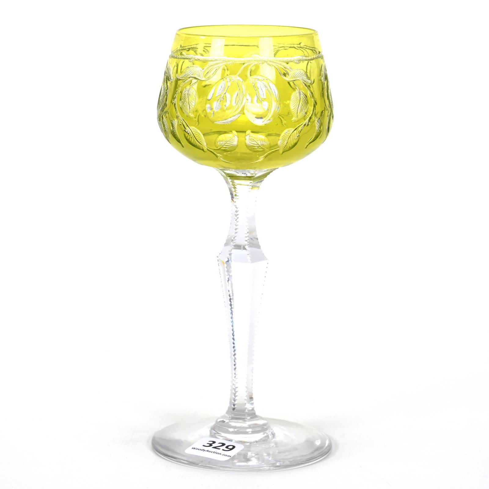 Wine Stem, Yellow Cut To Clear Art Glass: Wine Stem, Yellow Cut To Clear Art Glass, 7.25" x 3", Engraved Fruit Decor, Nice Quality, Don Henson Estate, Michigan. Part 3. This auction is the final dispersal of a collection of over 1,700 items s