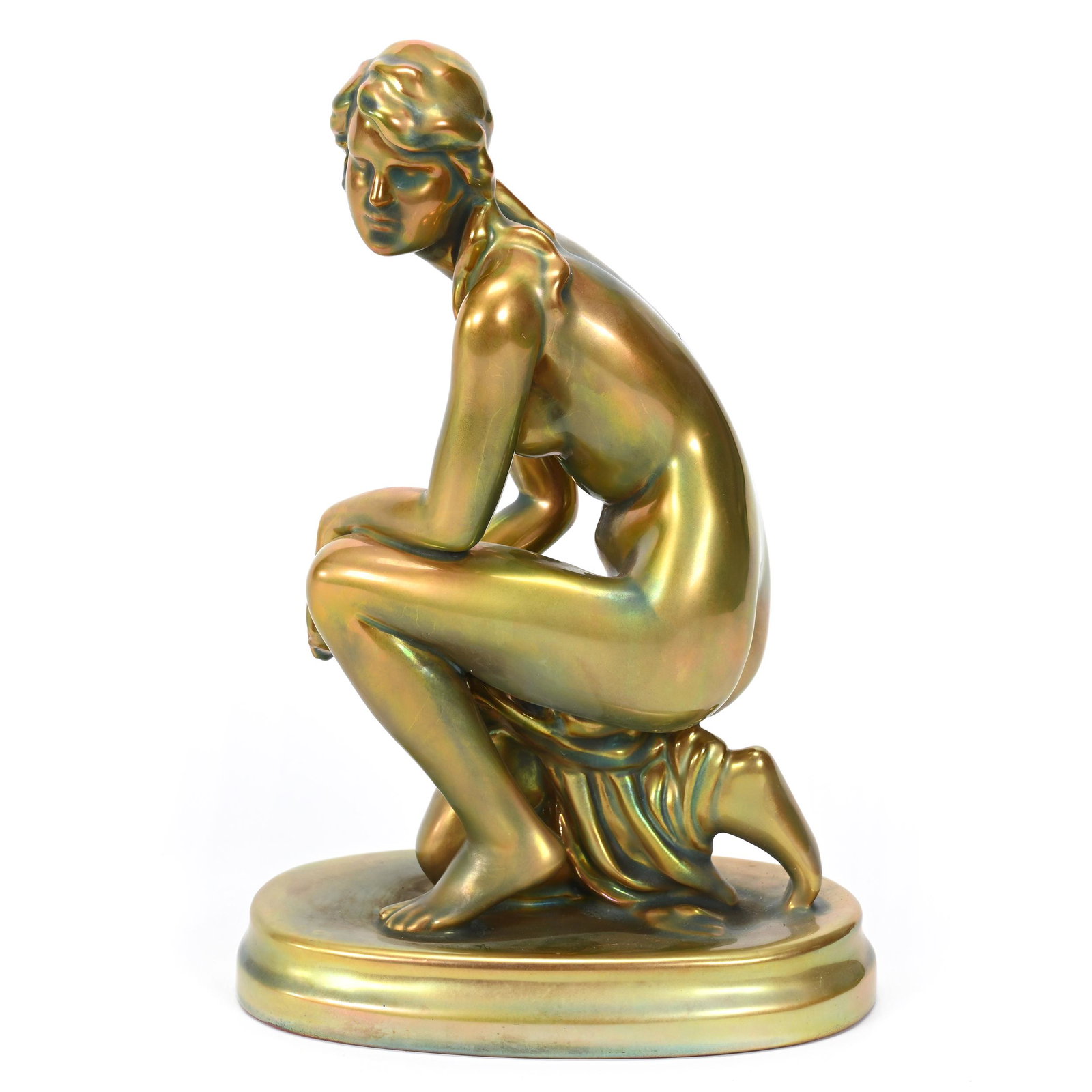 Figurine Marked Zsolnay Art Pottery: Figurine Marked Zsolnay Art Pottery, 9.5" x 6.25", Kneeling Nude, Green Iridescent Eosin Glaze, Don Henson Estate, Michigan. Part 3. This auction is the final dispersal of a collection of over 1,700 i