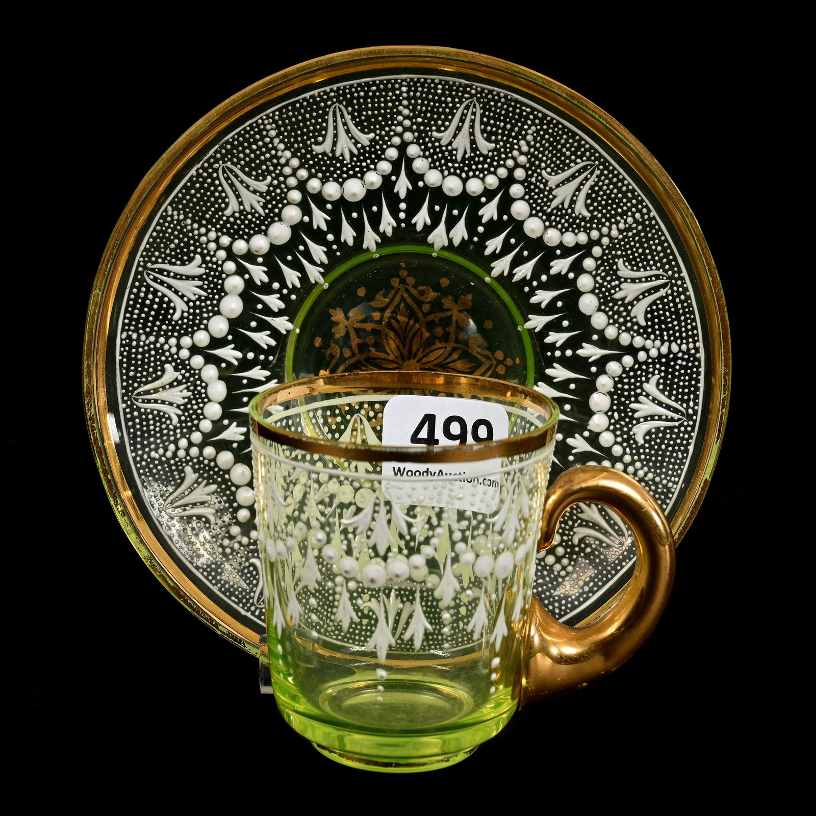 Cup & Saucer, Vaseline Bohemian Art Glass: Cup & Saucer, Vaseline Bohemian Art Glass, 2.25" x 4", White Enamel Lace And Garland Design, Highly Reactive Under Black Light, Don Henson Estate, Michigan. Part 3. This auction is the final dispersal