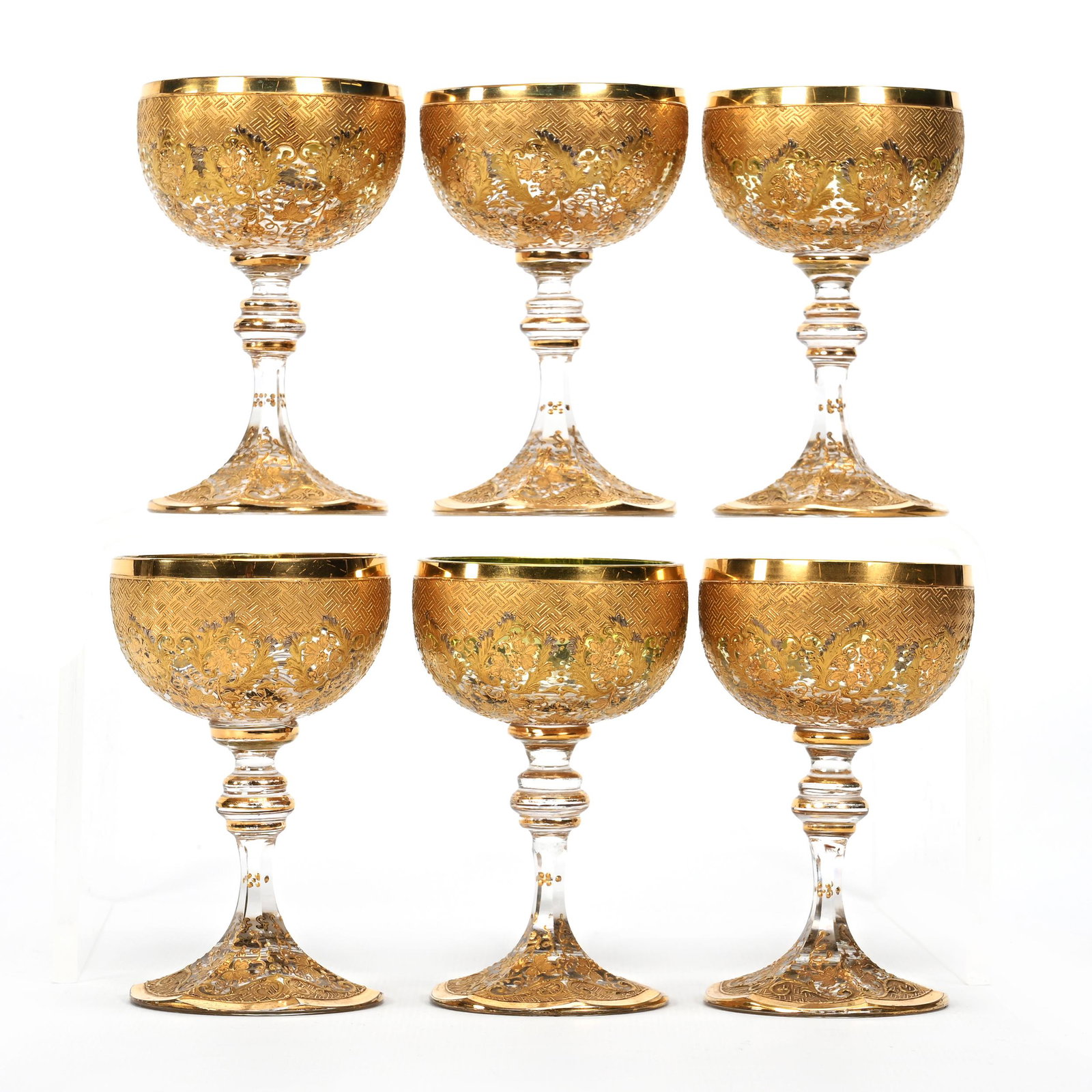 (6) Wine Stems, Green Shading To Clear Bohemian: (6) Wine Stems, Green Shading To Clear Bohemian, 4" x 2.5", Extensive Gold Vintage And Basketweave Design, One Wine Has Serious Base Chip, Don Henson Estate, Michigan. Part 3. This auction is the fina
