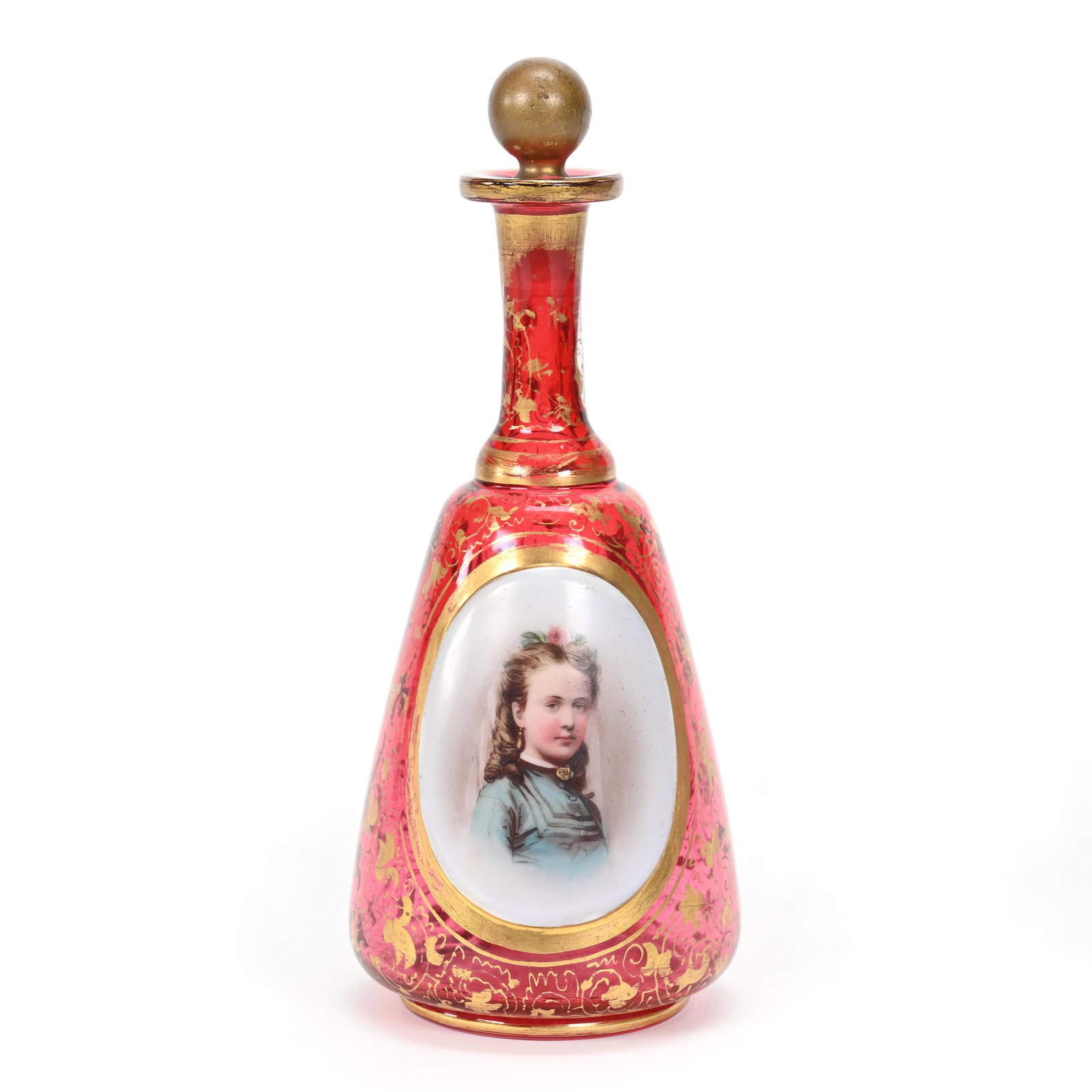 Bottle, Cranberry Bohemian Art Glass: Bottle, Cranberry Bohemian Art Glass, 7.5" x 3", Medallion Portrait Of Young Girl, Gold Stencil Highlights, Don Henson Estate, Michigan. Part 3. This auction is the final dispersal of a collection of 