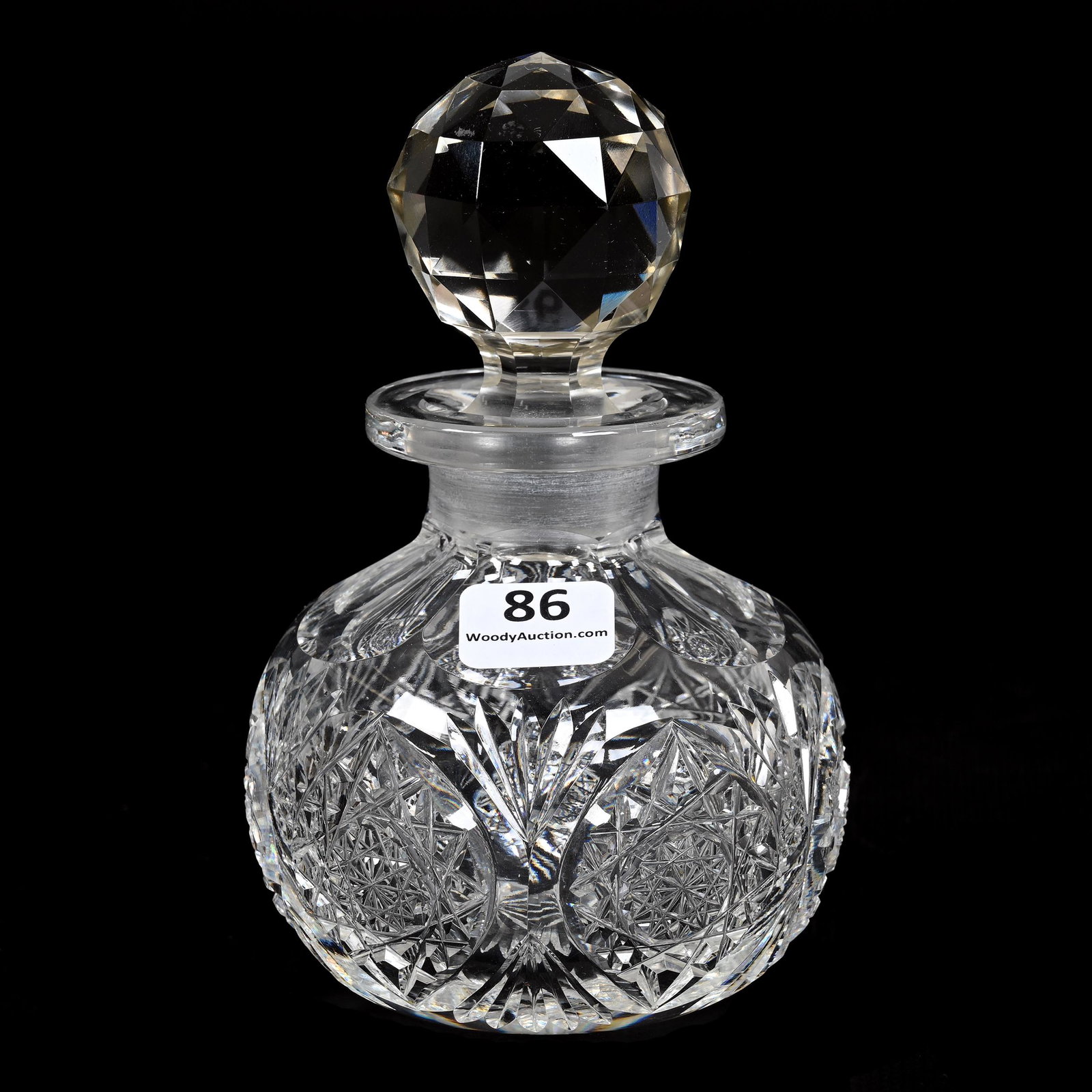 Cologne Bottle, American Brilliant Cut Glass: Cologne Bottle, American Brilliant Cut Glass, 5.5" x 3.25", Hobstar, Vesica And Fan Motif, Slight Surface Chip On Stopper, Slightly Off-Color Blank, Dennis R. Lemon Collection.