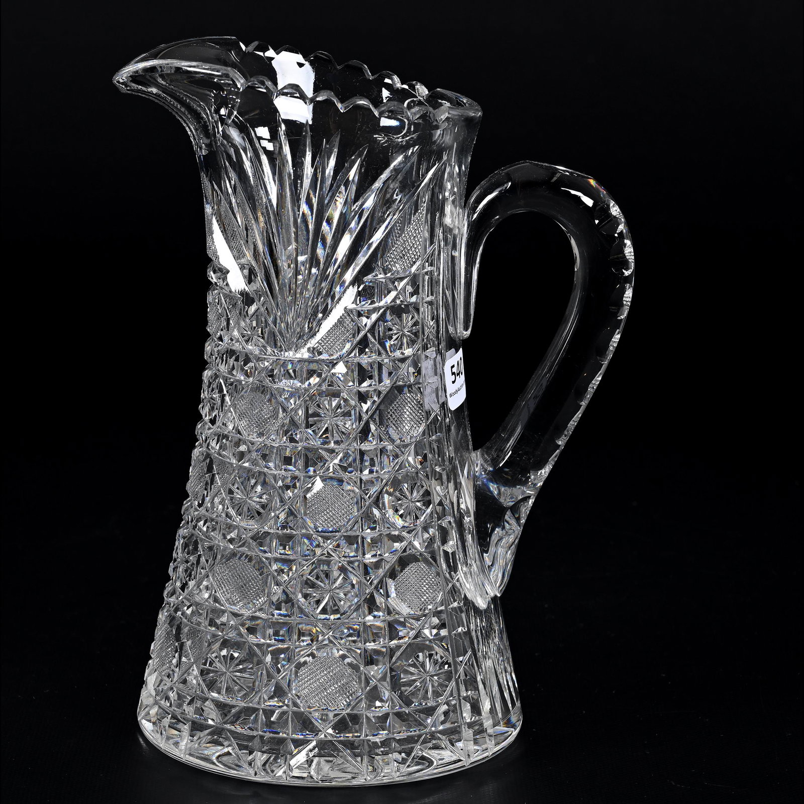 Water Pitcher, American Brilliant Cut Glass: Water Pitcher, American Brilliant Cut Glass, 9.5" x 7", Harvard Pattern, Double Notched Handle, Ray Cut Base, From The Collection Of Barbara And The Late Dr. William Shulhof