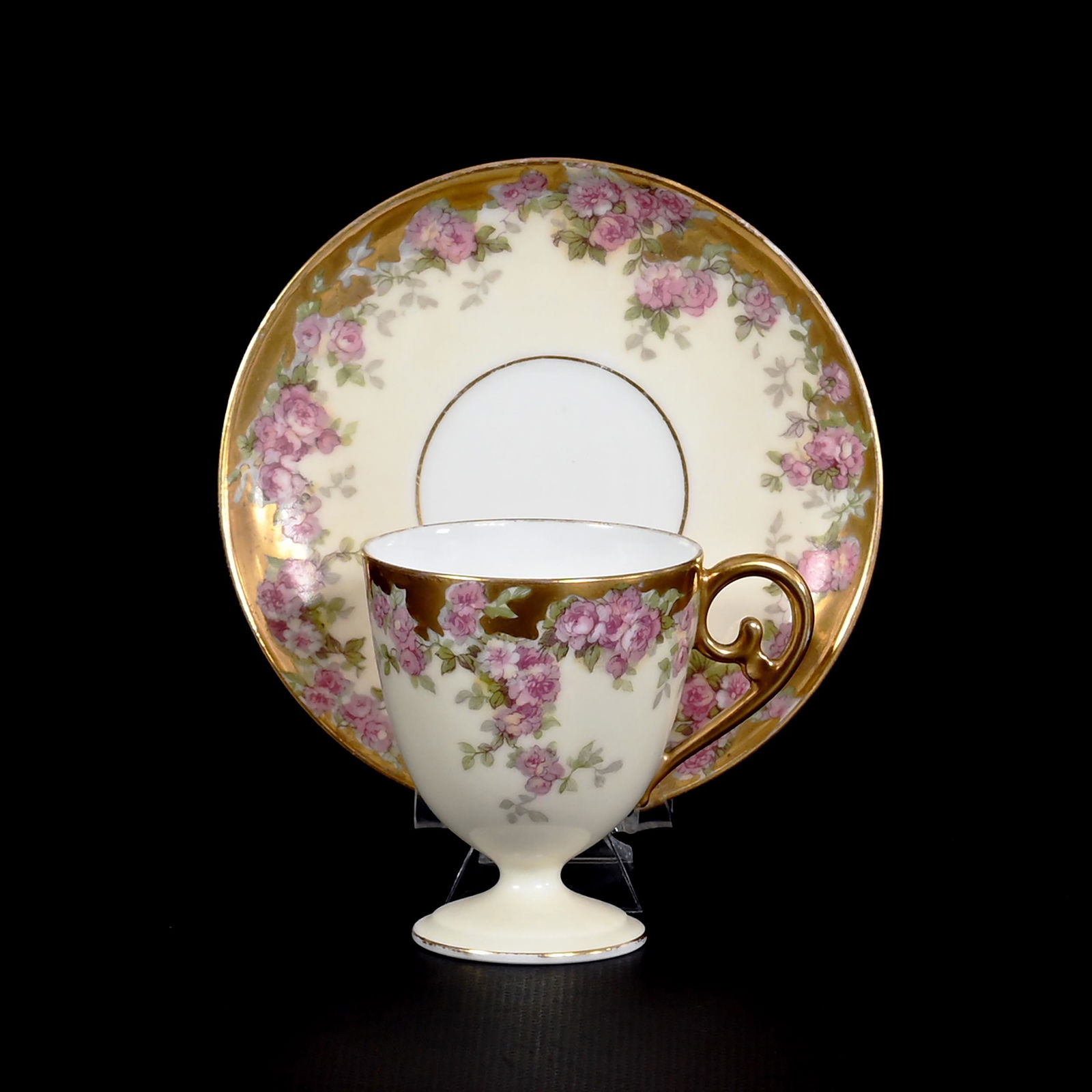 Cup & Saucer Marked L.S.S. Limoges: Cup & Saucer Marked L.S.S. Limoges, 3" x 4.25", Cream Tones, Scattered Pink Rose Decor, Heavy Gold Trim, The David & Marlene Howard Collection.