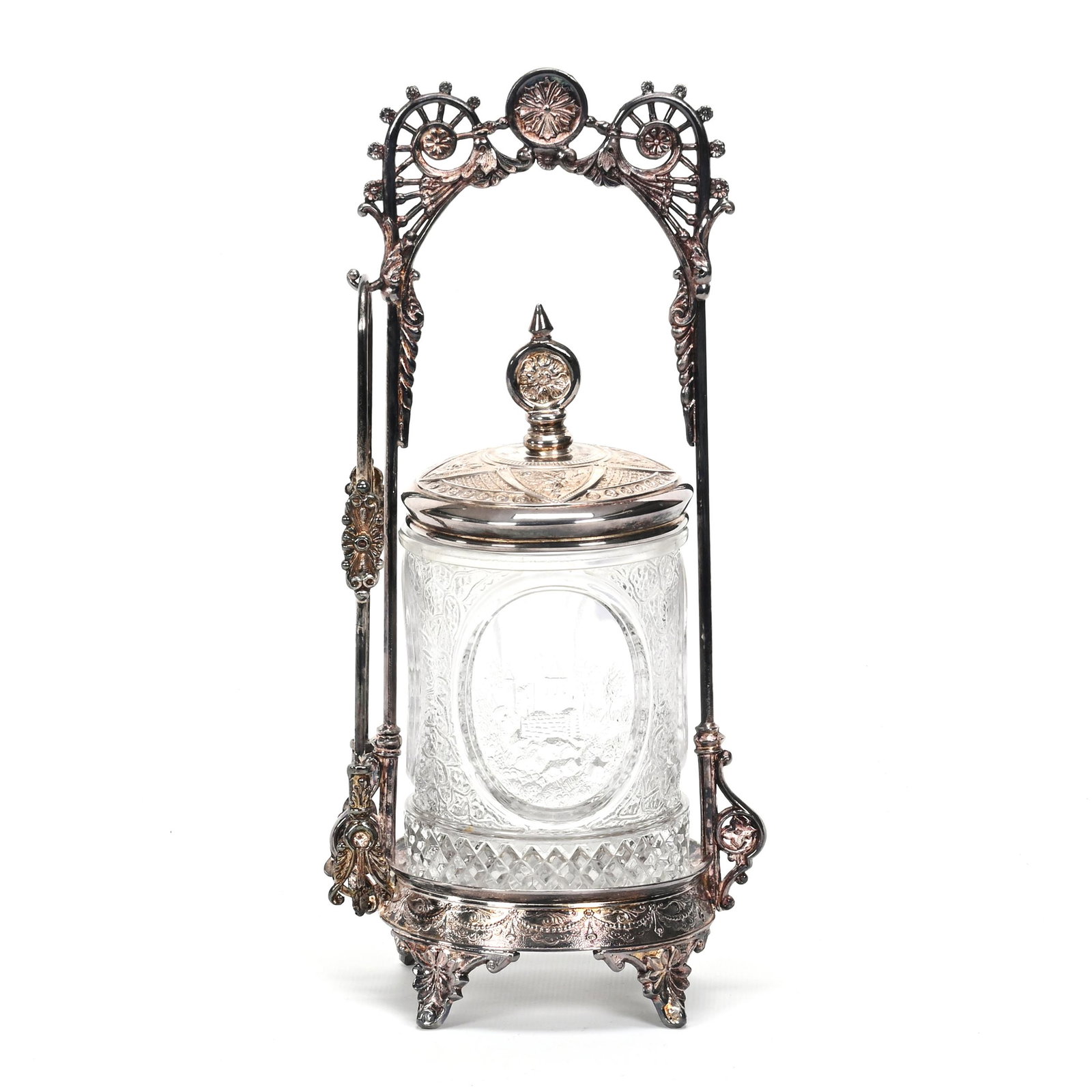 Victorian Pickle Castor: Victorian Pickle Castor, 10.75" x 5", Clear E257"Little River" Pattern Glass Insert With Embossed Medallion Scenes, Set On Derby #107 Silverplate Frame, The David & Marlene Howard Collection.