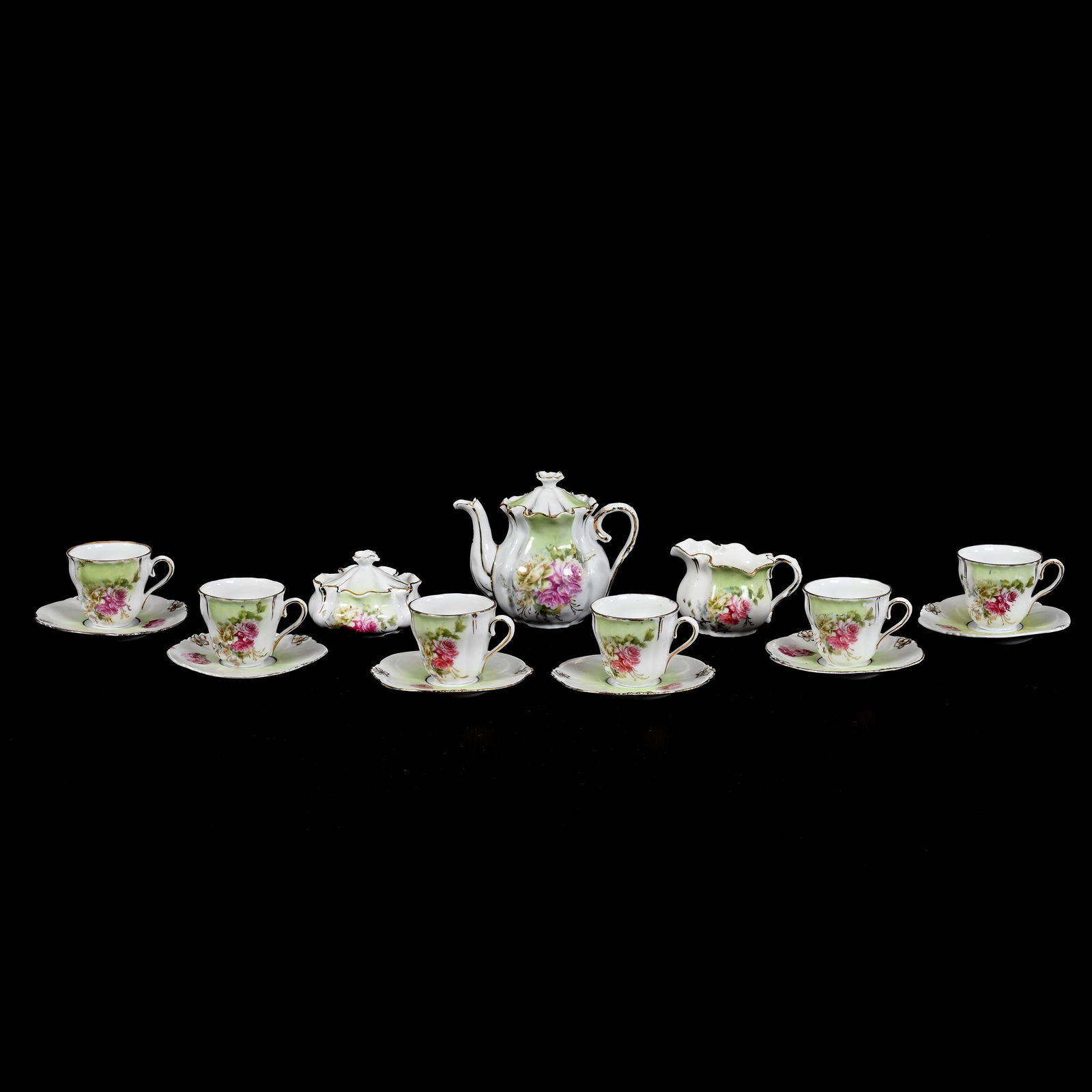 Child's Tea Set, Unmarked R.S. Prussia, (15) Piece: Child's Tea Set, Unmarked R.S. Prussia, (15) Piece, Green And White, Pink And Yellow Rose Decor, (1) 4" X 4.5" Teapot, (1) Creamer and Sugar Set, Chip On Sugar Finial, (6) Cups and Saucers, Rim Nick O