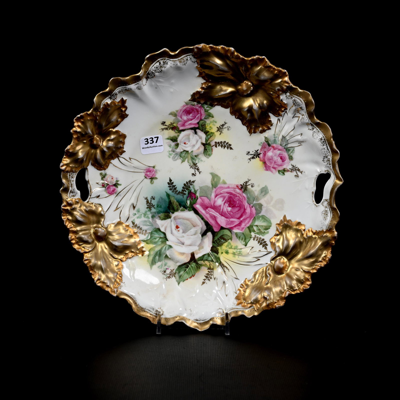 Cake Plate Marked R.S. Prussia: Cake Plate Marked R.S. Prussia, 10.75", Carnation Mold, White And Green Tones, Pink And White Rose Decor, Two Tone Gold Border, Repair To Rim Chip, Private Collection.