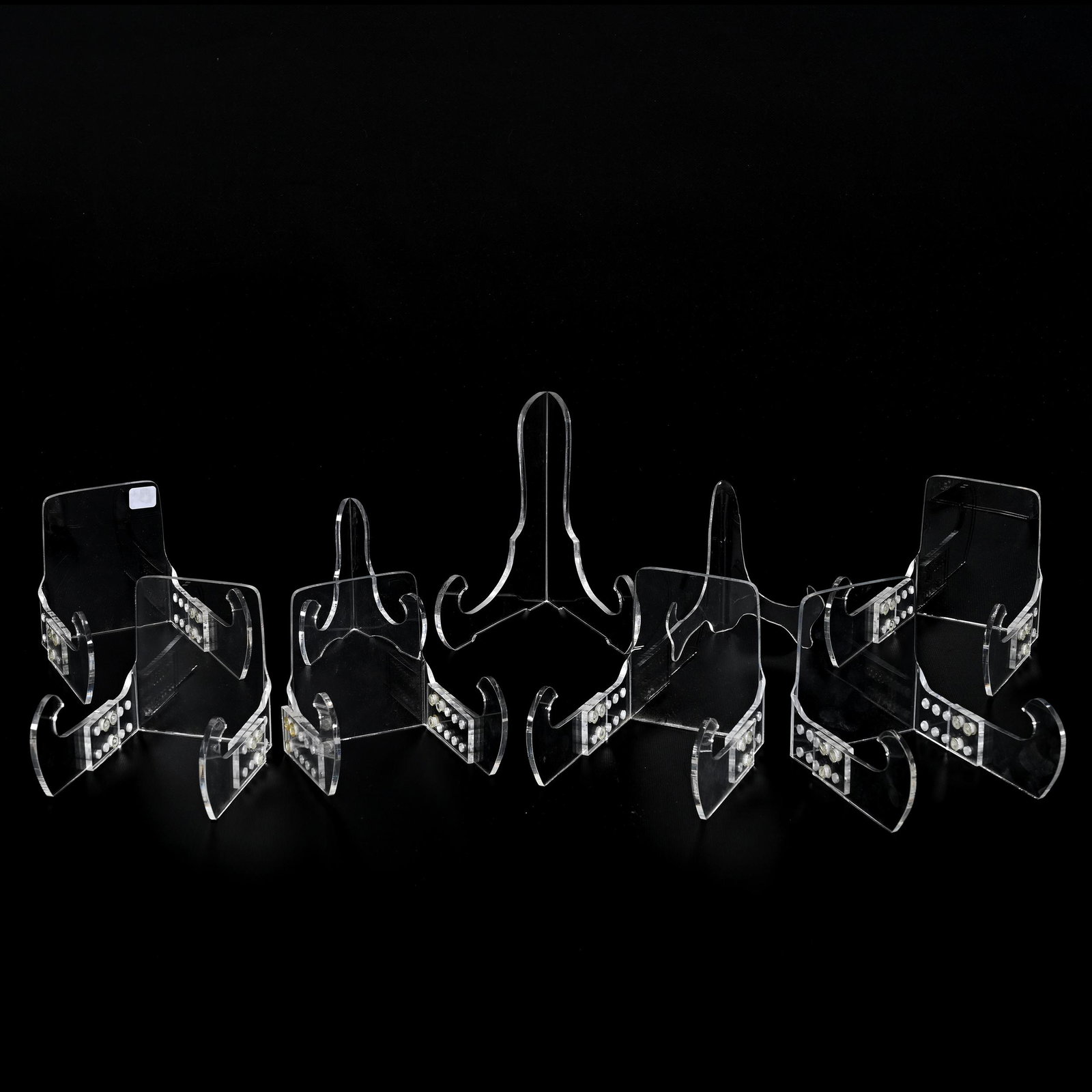 (9) Plexiglass Bowl & Plate Holders: (9) Plexiglass Bowl & Plate Holders, Various Shapes And Designs, Tallest Is 7.25", Shortest Measures 4.5", See Photos For Details, Bonnie Anderson (Peterson) Collection.