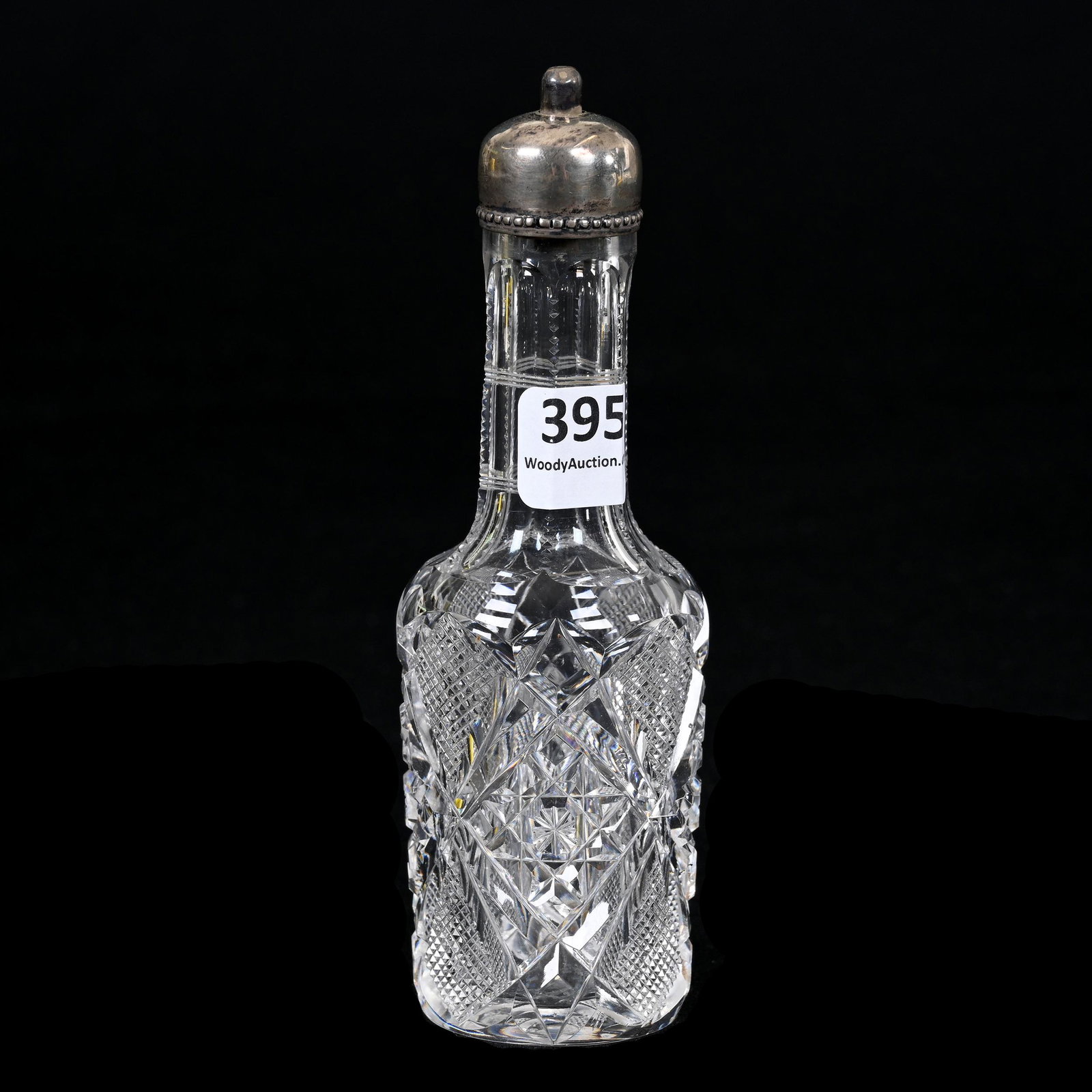 Sauce Bottle, American Brilliant Cut Glass: Sauce Bottle, American Brilliant Cut Glass, 5.5" x 1.75", Hobstar And Strawberry Diamond Motif, Sterling Silver Top, Carl Putzka Collection, Texas.