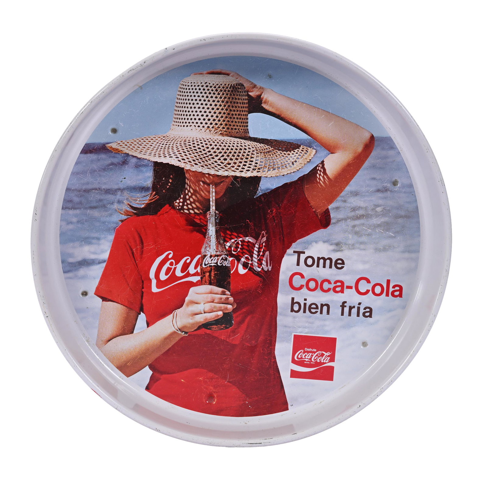 1960's Coca-Cola Mexican Tray, "Girl In Floppy Hat": 1960's Coca-Cola Mexican Tray, "Girl In Floppy Hat", 13" diameter, "Tome Coca-Cola Bien Fria", Light Surface Scratches & Wear, Overall Good Condition, Private Collection, Kansas.