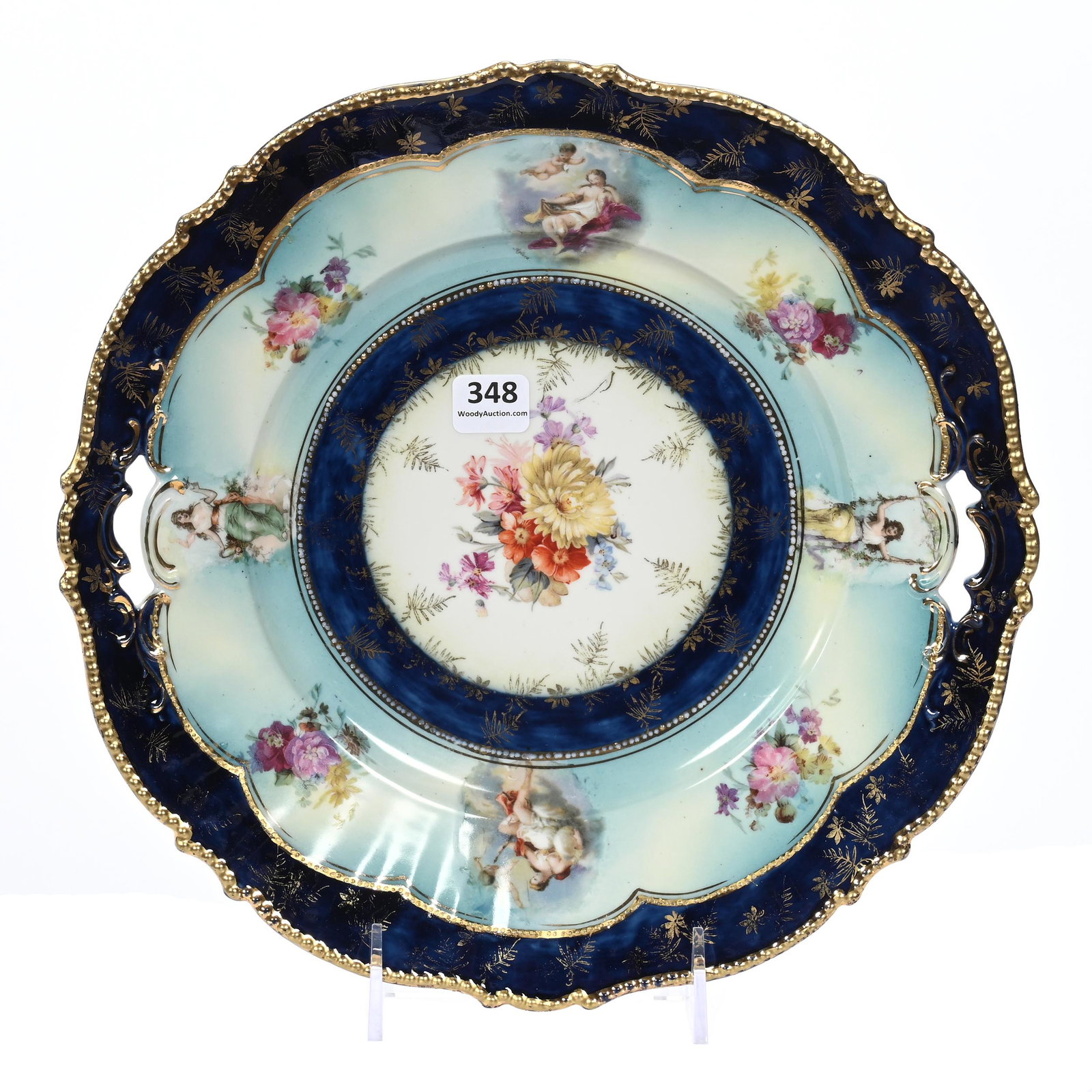 Cake Plate, Unmarked R.S. Prussia: Cake Plate, Unmarked R.S. Prussia, 11", Mold #343, White, Blue And Cobalt Blue With Wild Floral Decor, Images Of Women And Cherub, Michigan Private Collection.
