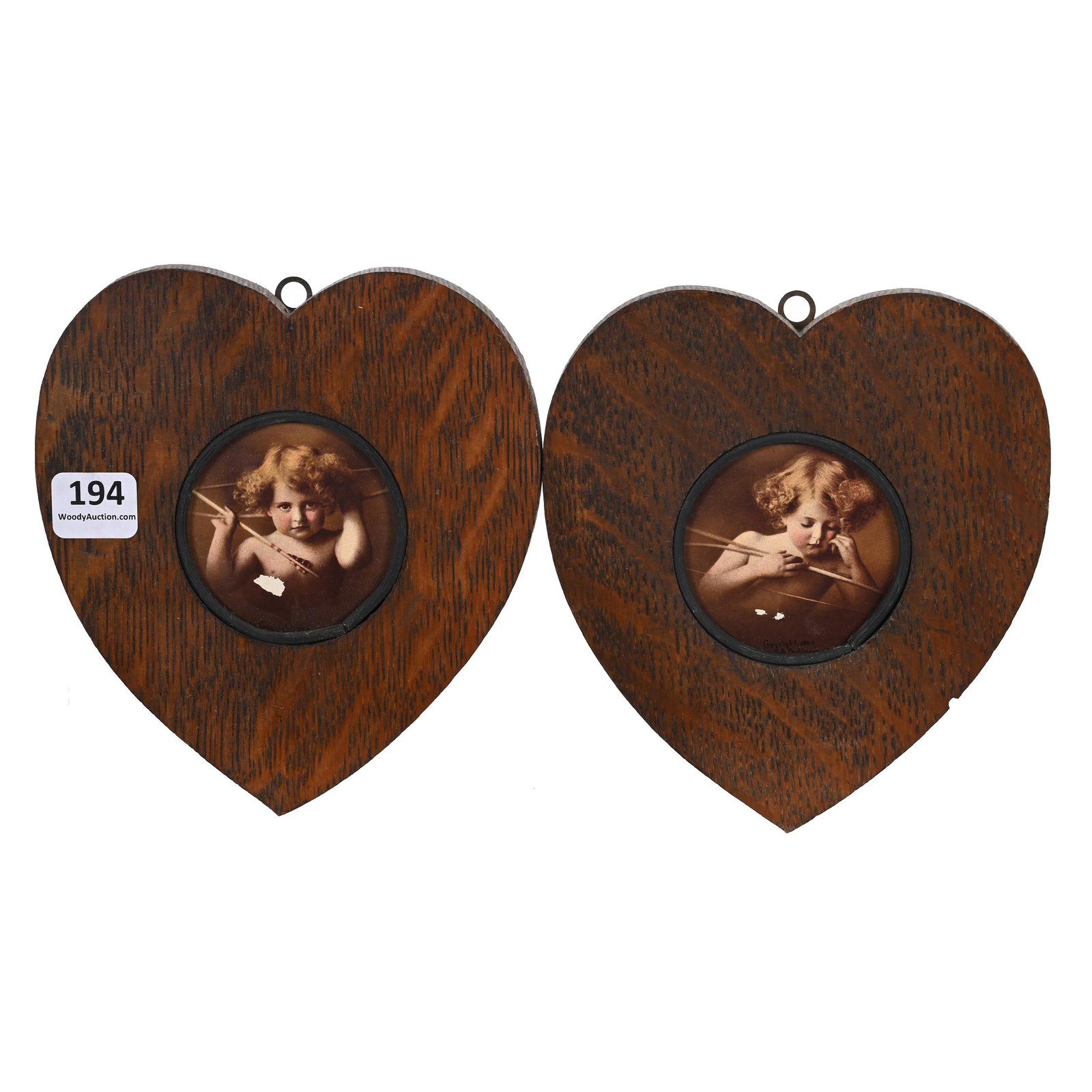 Pair Oak Heart Shaped Frames With Cupid Prints (1 of 2)