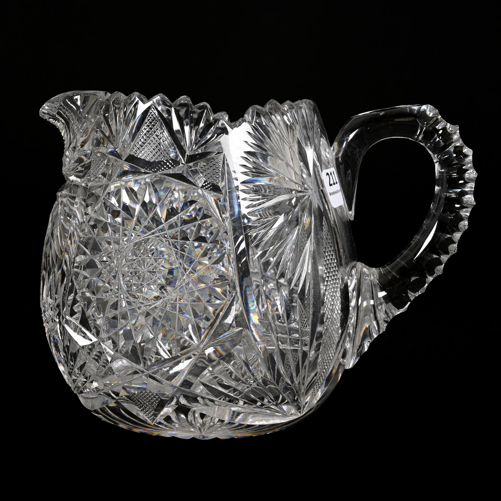 Pitcher, American Brilliant Cut Glass: Pitcher, American Brilliant Cut Glass, 6.25" x 8", Hobstar, Strawberry Diamond, Vesica And Fan Motif, Triple Notched Handle, Ray Cut Base, Estate Of Dr. Barry and Dee Free.