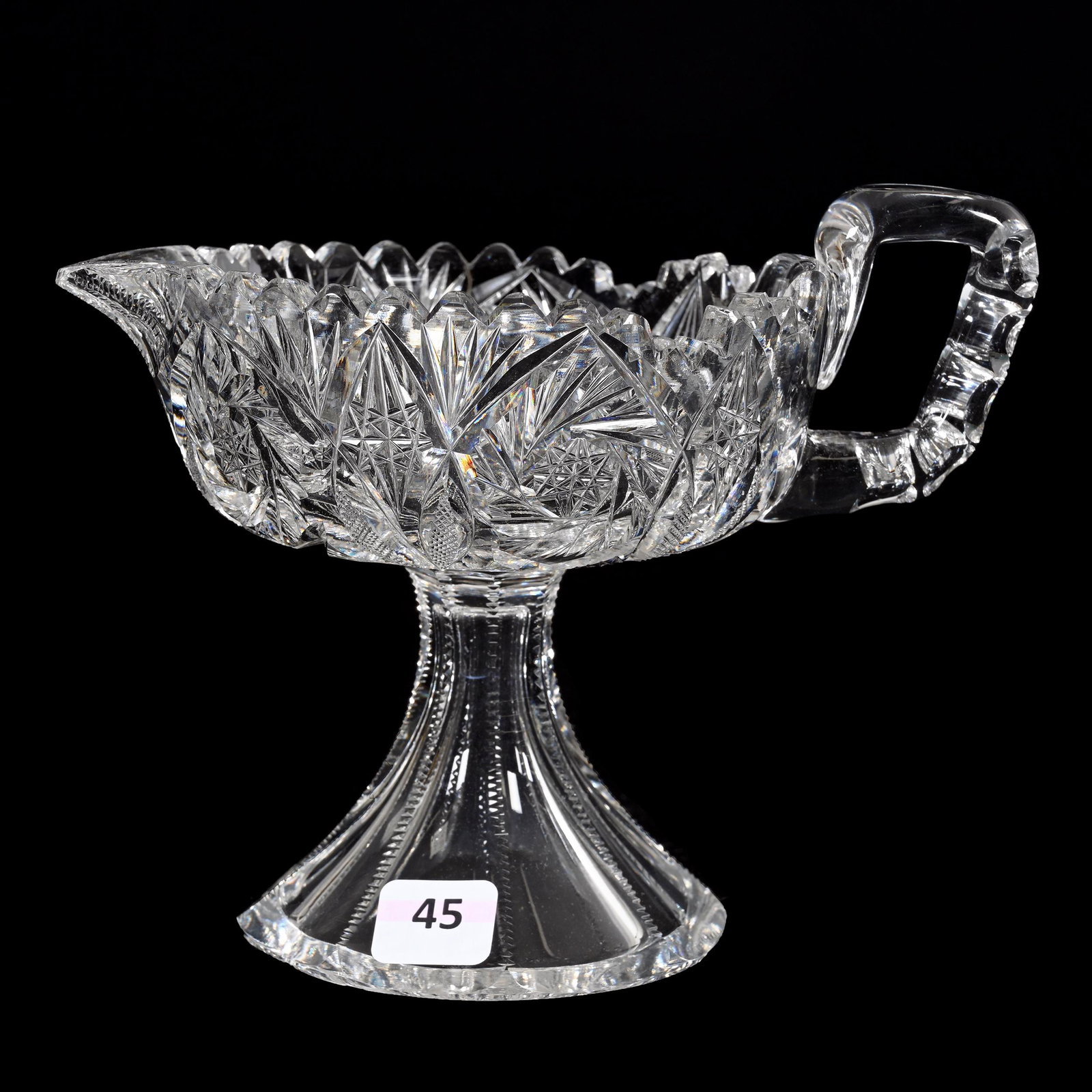Pedestal Sauce Boat, American Brilliant Cut Glass: Pedestal Sauce Boat, American Brilliant Cut Glass, 5.75" x 7.25", Pinwheel, Vesica, Strawberry Diamond, Hobstar And Fan Motif, Petticoat Foot, Two Base Chips, Estate Of Dr. Barry and Dee Free.