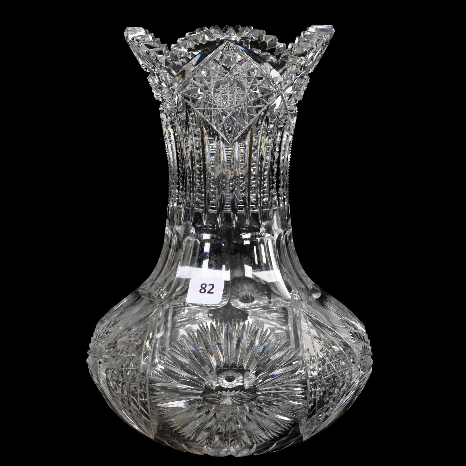 Vase, American Brilliant Cut Glass: Vase, American Brilliant Cut Glass, 10" x 7", Sunburst, Vesica, Nailhead Diamond, Hobstar, Prism And Panel Motif, Ray Cut Base, Outside Tooth Nick, Estate Of Dr. Barry and Dee Free.