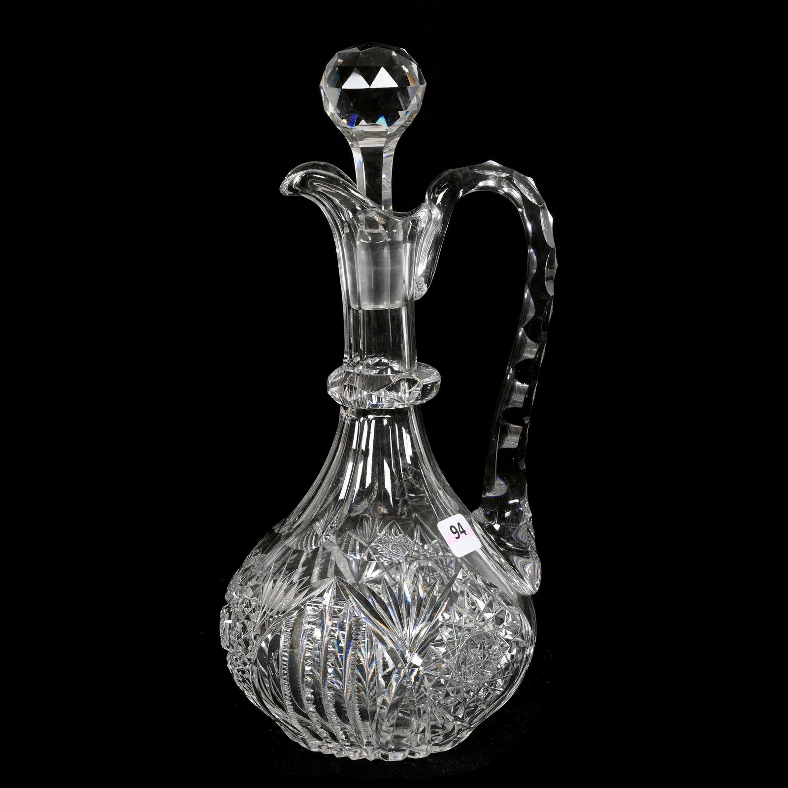 Handled Decanter, American Brilliant Cut Glass: Handled Decanter, American Brilliant Cut Glass, 12" x 5.5", Hobstar, Prism And Fan Motif, Facet Cut Ring Neck, Triple Notched Handle, Ray Cut Base, Estate Of Dr. Barry and Dee Free.