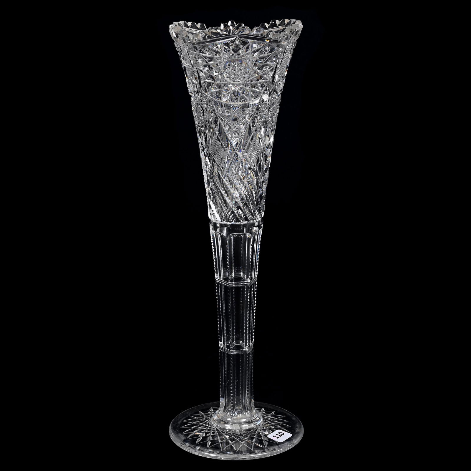 Trumpet Vase, American Brilliant Cut Glass: Trumpet Vase, American Brilliant Cut Glass, 16" x 5", Hobstar, Cane, Strawberry Diamond And Swirled Prism Motif, Hobstar Base, Small Outside Rim Tooth Chip, Estate Of Dr. Barry and Dee Free.