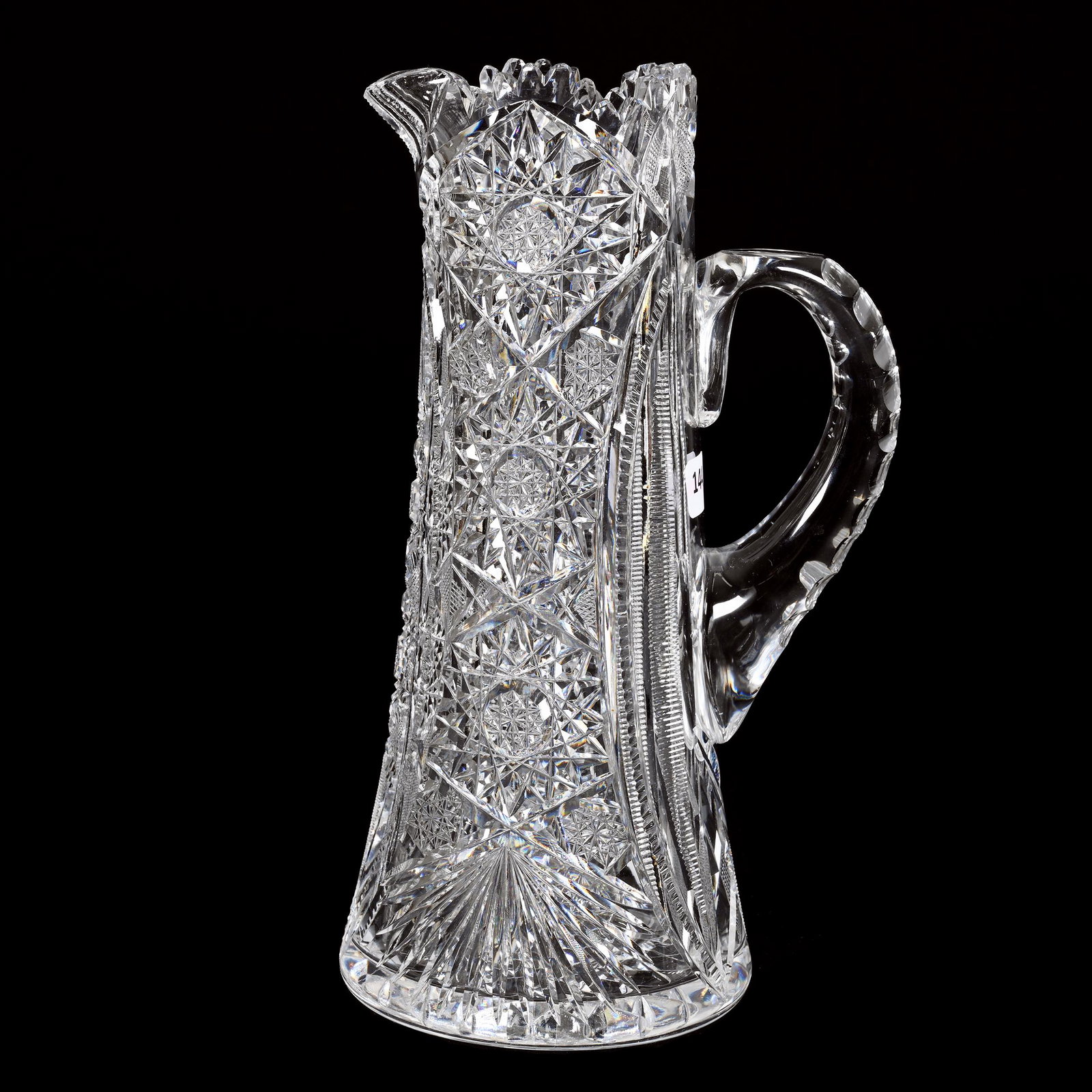 Pitcher, American Brilliant Cut Glass: Pitcher, American Brilliant Cut Glass, 11.25" x 6.5", Hobstar, Vesica, Strawberry Diamond, Prism And Fan Motif, Hobstar Base, Small Tooth Chip, Interior Spout Roughness, Estate Of Dr. Barry and Dee Fr