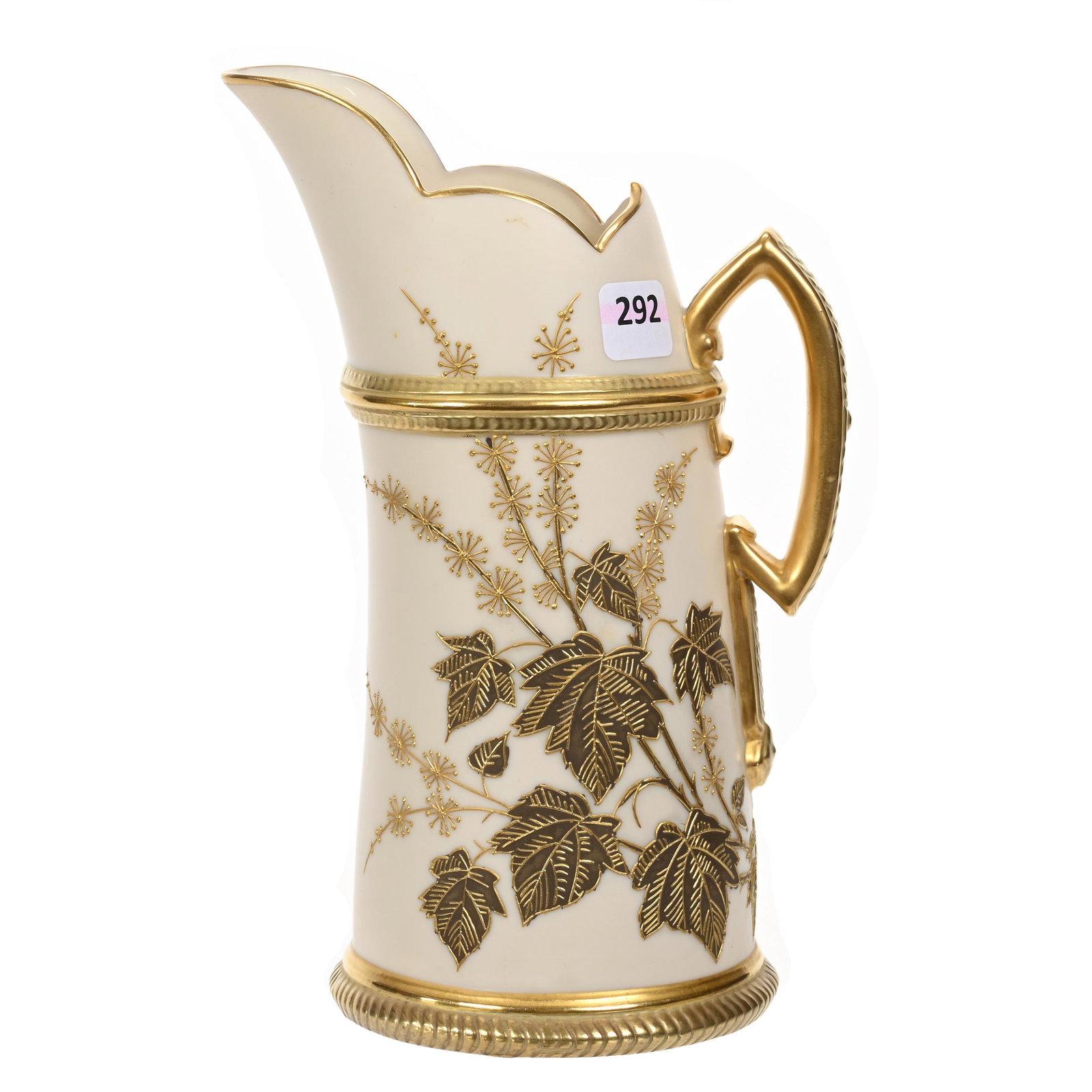 Pitcher Marked Royal Worcester: Pitcher Marked Royal Worcester, 8.75" x 5.75", Tusk Shape, Cream Tones, Two Tone Gold Leaf Decor, Hairline At Rim, Estate Of Dr. Barry and Dee Free.