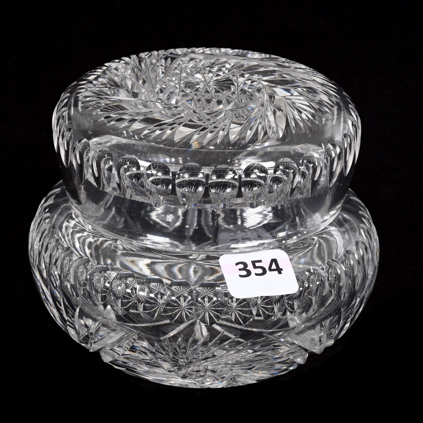 Covered Box, American Brilliant Cut Glass: Covered Box, American Brilliant Cut Glass, 3.75" x 4.5", Pinwheel, Punty And Fan Motif, Two Rim Chips On Lid, One Nick On Jar Rim, Ground Rim, Estate Of Dr. Barry and Dee Free.