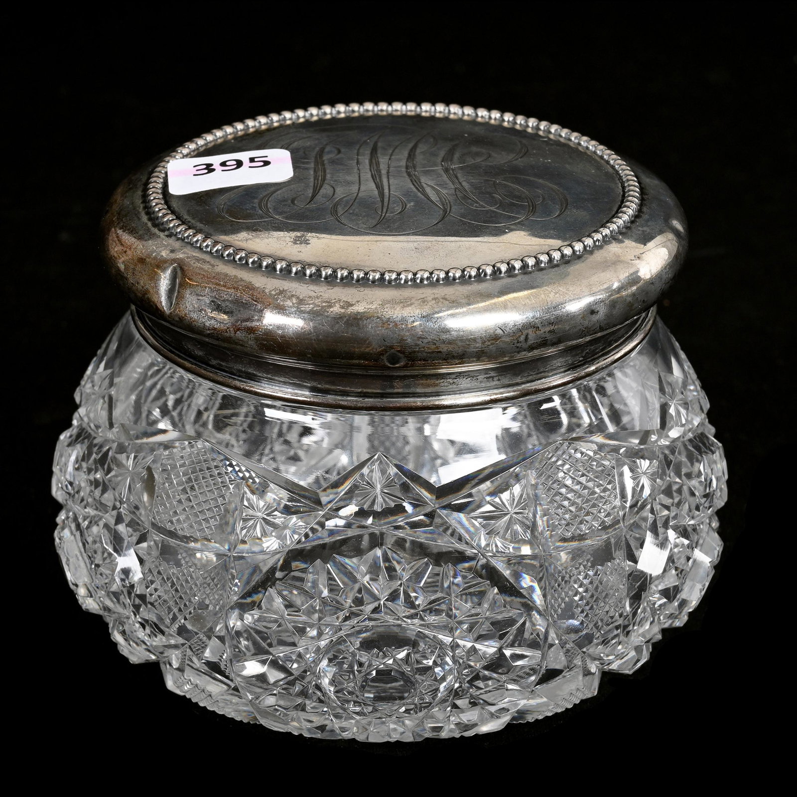 Covered Jar, American Brilliant Cut Glass: Covered Jar, American Brilliant Cut Glass, 3.75" x 4.75", Hobstar, Strawberry Diamond And Star Motif, Ray Cut Base, Sterling Silver Lid With Monogram, Estate Of Dr. Barry and Dee Free.