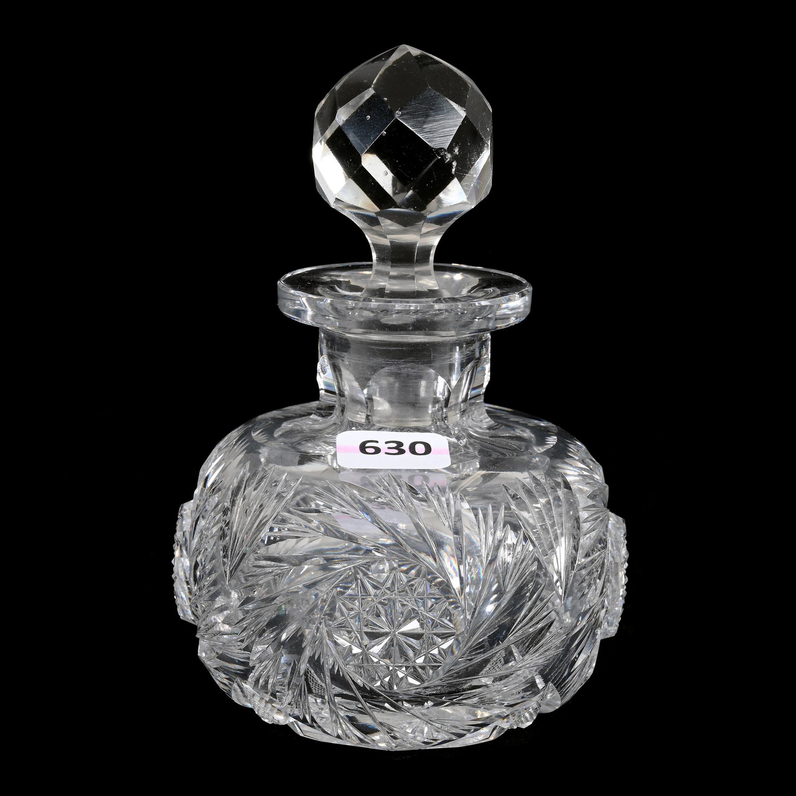 Cologne Bottle, American Brilliant Cut Glass: Cologne Bottle, American Brilliant Cut Glass, 5.5" x 3.75", Pinwheel And Fan Motif, Ray Cut Base, Stopper Has Some Surface Chips And Is Off-Color, Estate Of Dr. Barry and Dee Free.