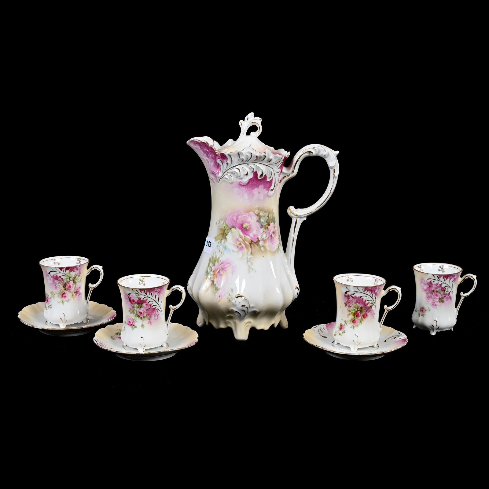 Chocolate Set, Unmarked R.S. Prussia: Chocolate Set, Unmarked R.S. Prussia, Plume Mold, Pink, Cream And White Tones, Floral Decor, (1) 9.75" x 6.75" Chocolate Pot, Finial Chip, (3) Matching 3.25" x 4.5" Cups And Saucers, One Extra Cup Wit