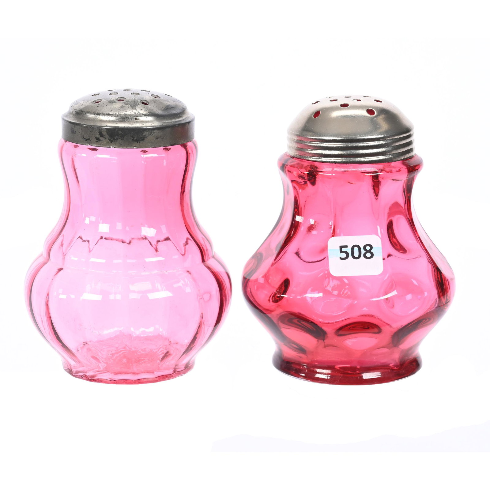 (2) Sugar Shakers, Cranberry Art Glass: (2) Sugar Shakers, Cranberry Art Glass, 4.75", (1) Paneled Coinspot, (1) Optic Rib, Indiana Private Collection.
