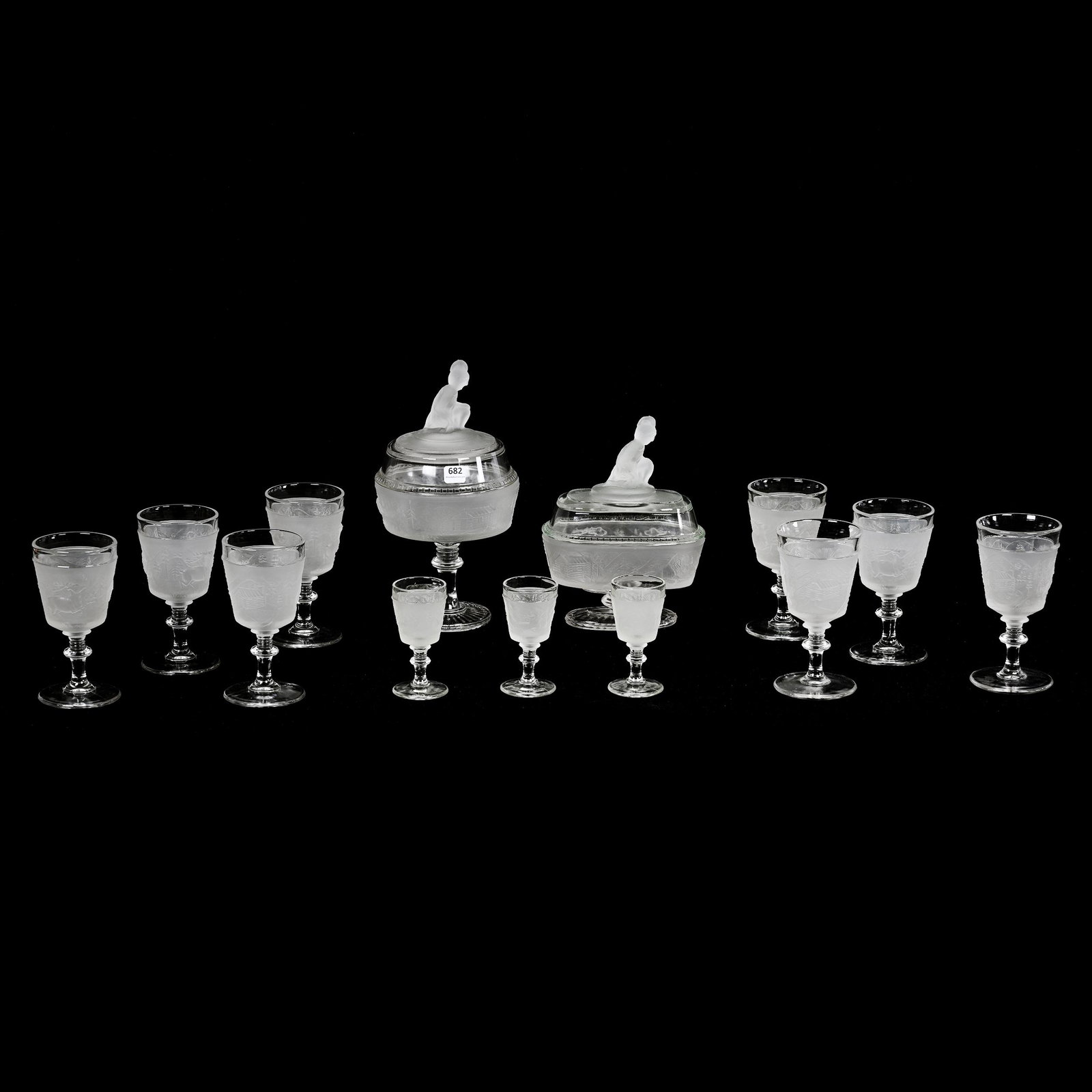 (13) Original Westward Ho Pattern Glass Items: (13) Original Westward Ho Pattern Glass Items, (1) 11" x 6" Covered Compote, (1) 9" x 7" Oval Covered Pedestal Compote, (8) 6.5" Goblets, (3) 4.25" Wine Stems, The Authenticity Of The Two Covered Comp