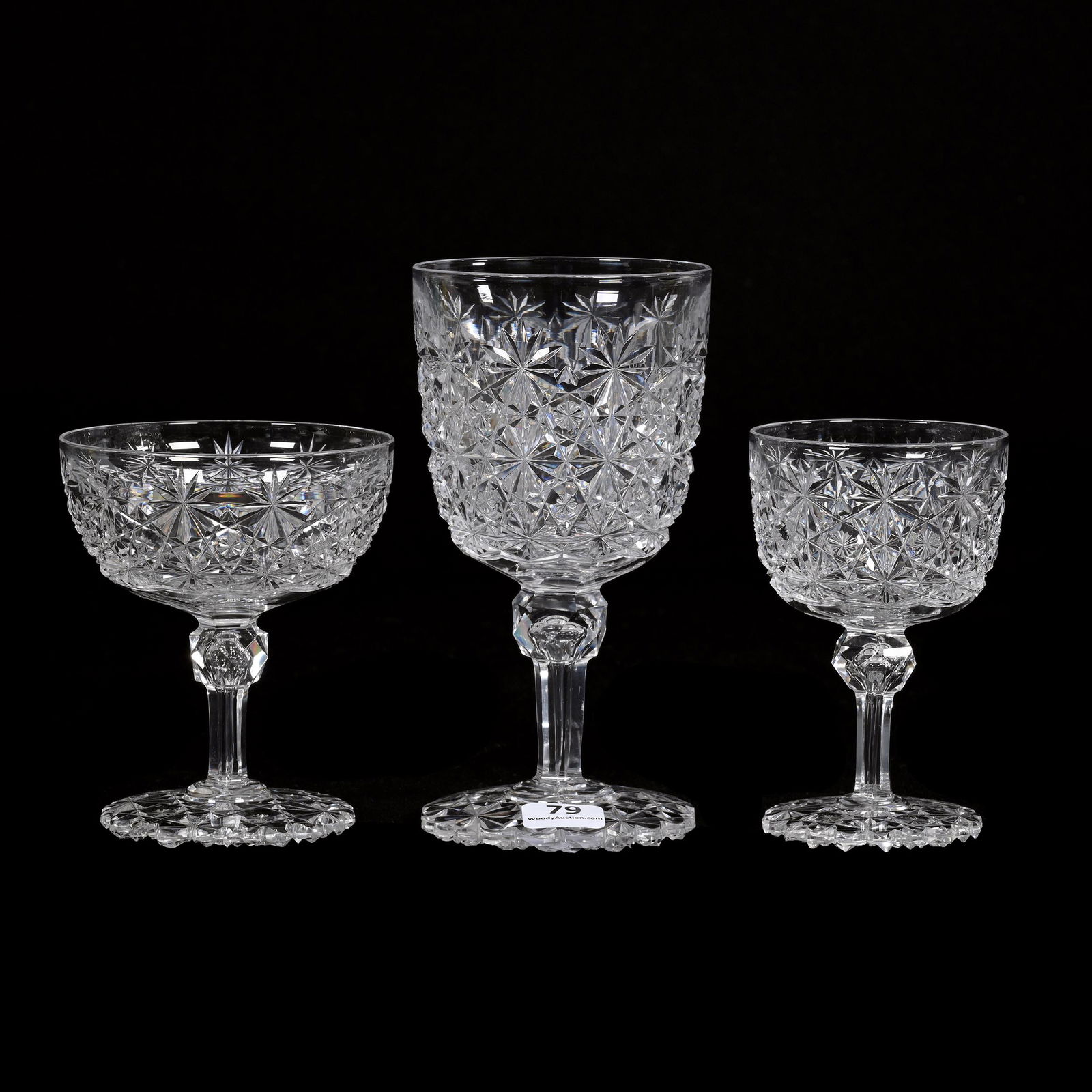 (3) Stems, ABCG, Russian Pattern, Star Cut Buttons: (3) Stems, American Brilliant Cut Glass, Russian Pattern, Star Cut Buttons, Scalloped Pattern Cut Foot, (1) 6.25" X 3.25" Goblet, (1) 4.25" X 2.75" Wine, (1) 4.25" X 3.5" Champagne, Nancy And Taylor A