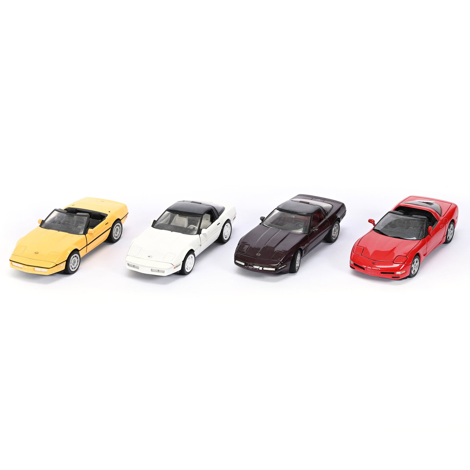 (4) Franklin Mint Precision Corvettes, 1/24th Scale: (4) Franklin Mint Precision Corvettes, 1/24th Scale, With Original Labels, (1) 1986, (1) 1988, (1) 1993, (1) 1997, Kansas Private Collection