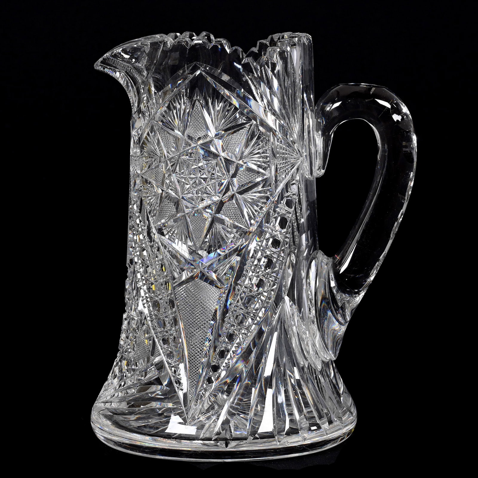Water Pitcher, American Brilliant Cut Glass: Water Pitcher, American Brilliant Cut Glass, 9" x 7", Flashed Hobstar, Vesica, Cane, Strawberry Diamond And Fan Motif, Ray Cut Base, Outside Nick On Spout, Pattern Chip At Base, Sidlinger Estate Colle