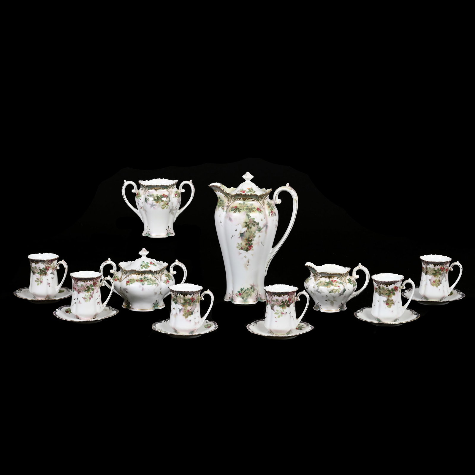 Chocolate Set Marked R.S. Prussia: Chocolate Set Marked R.S. Prussia, White And Green Satin Finish, Leaf And Berry Decor, (1) 9.75" X 6.5" Chocolate Pot, Matching Creamer And Sugar, Spooner And (6) Cups And Saucers, Pot With Repair Und