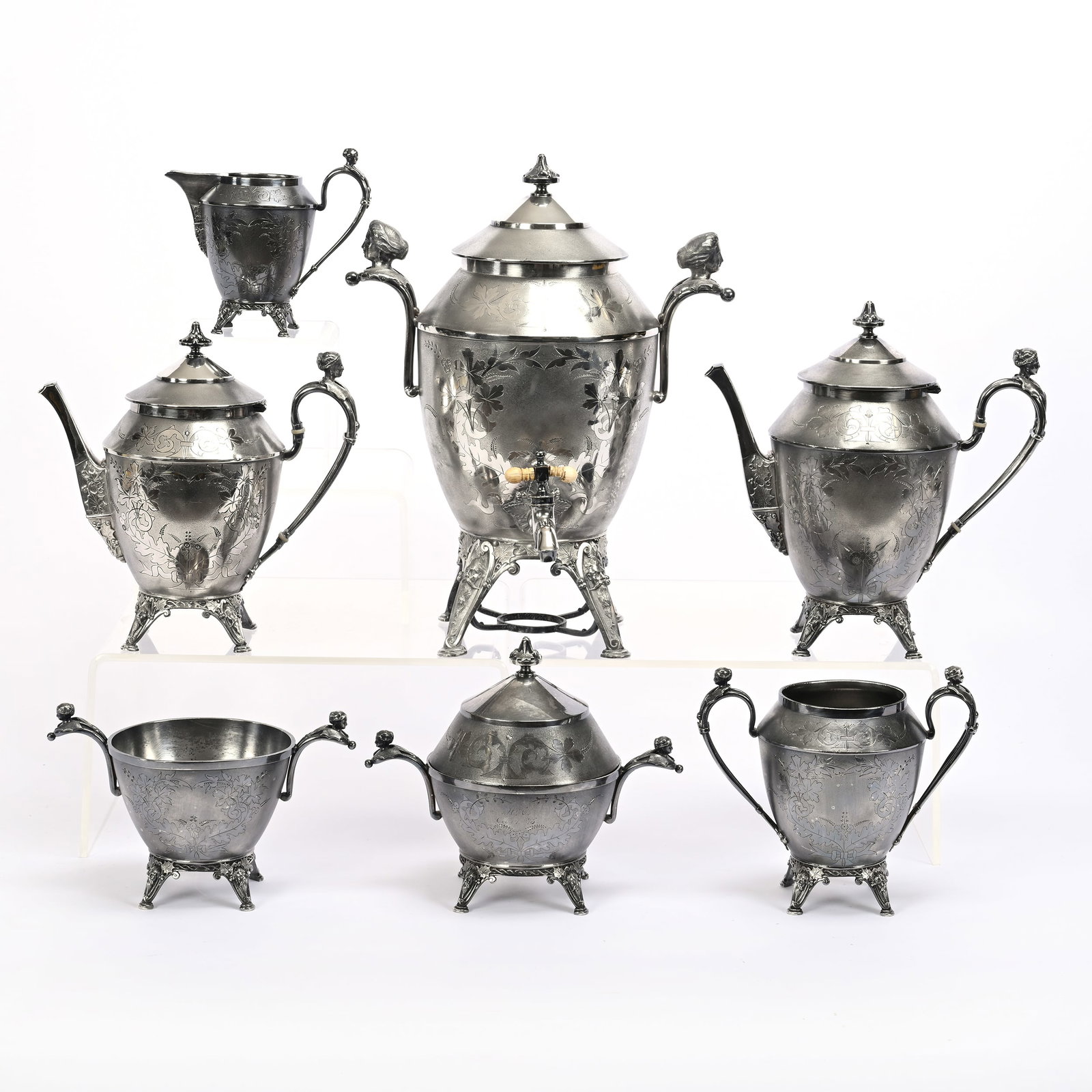 Victorian Silver Plate Tea & Coffee Service: Victorian Silver Plate Tea & Coffee Service, Marked Meriden #1887, Patent 1872, (1) 14.5" X 12" Water Urn (Bone Handle Damaged, Small Dent Near Spigot), (1) 10.5" Coffee Pot, (1) 9.5" Tea Pot, (1) Cre