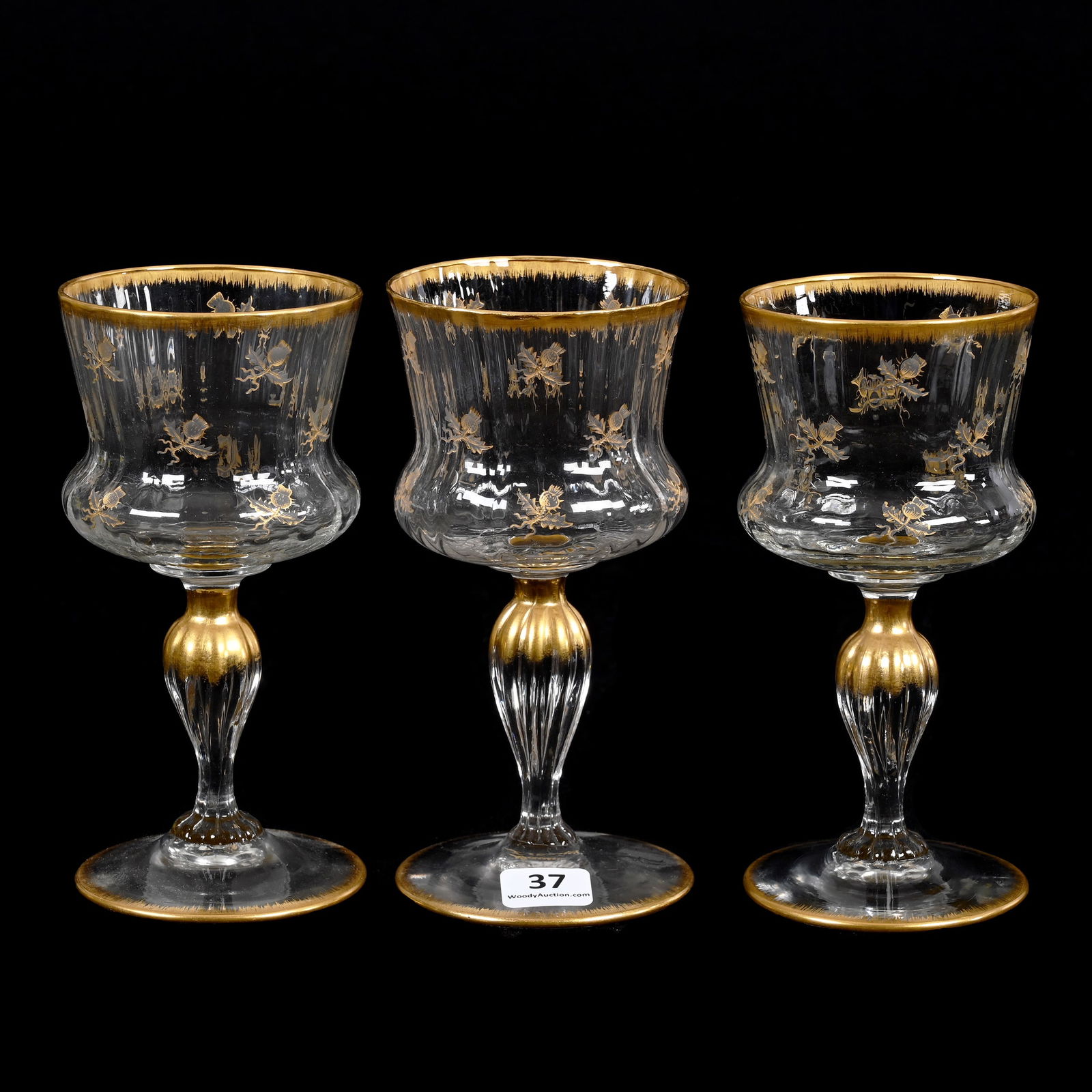 (3) Wine Stems Signed Daum Nancy French Art Glass: (3) Wine Stems Signed Daum Nancy French Art Glass, 6" x 3", Clear Optic Rib With Engraved Thistle Decor And Gold Stencil Highlights, Nice Set, David M. Shaw Collection, Nebraska