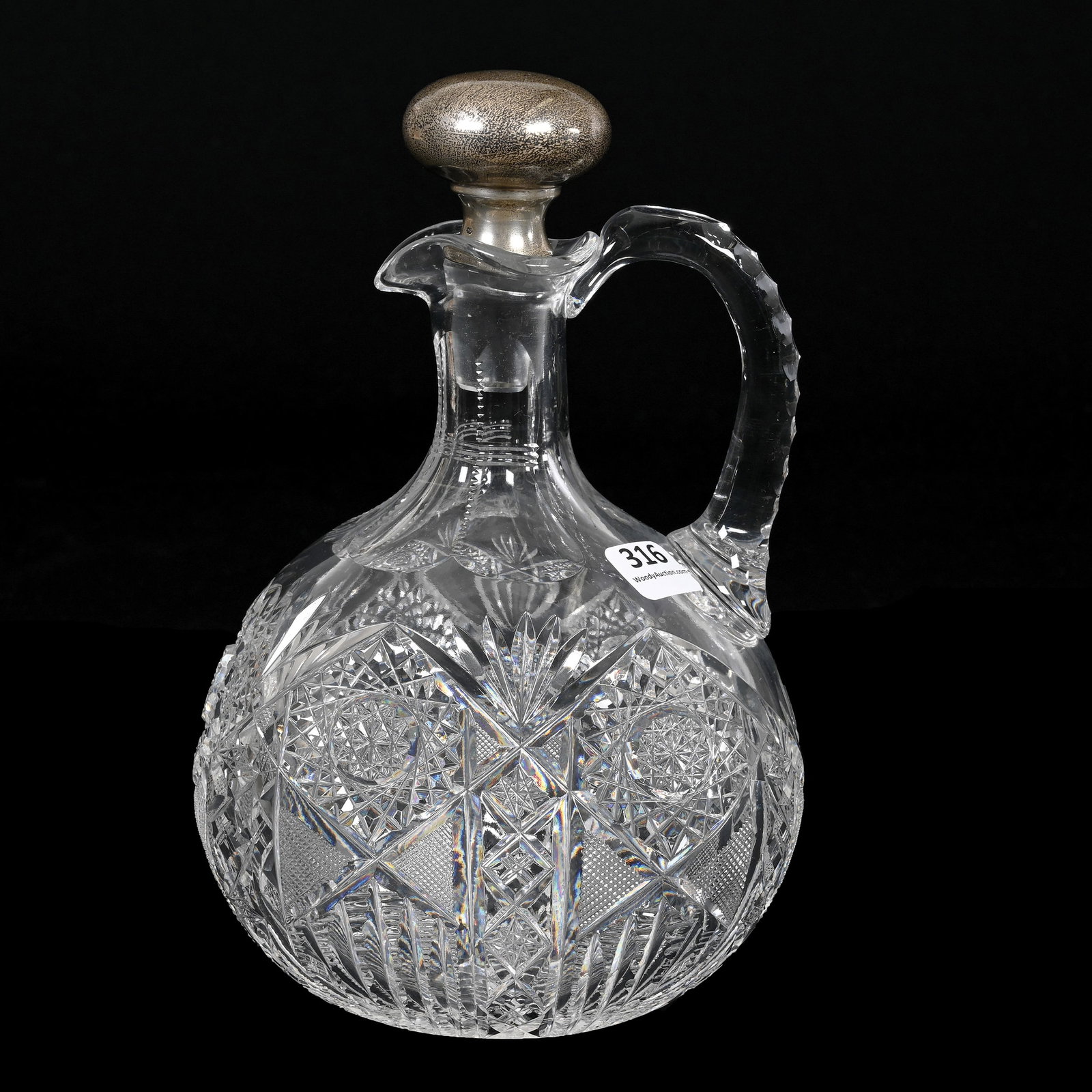 Ovoid Decanter, American Brilliant Cut Glass: Ovoid Decanter, American Brilliant Cut Glass, 8.5" x 5.5", Hobstar, Strawberry Diamond, Prism, Crosshatch And Fan Motif, Triple Notched Handle, Ray Cut Base, Sterling Silver Stopper Marked Gorham, Vir