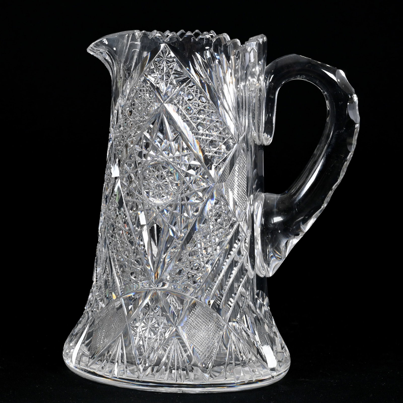 Pitcher, American Brilliant Cut Glass: Pitcher, American Brilliant Cut Glass, 9" x 7.25", Hobstar, Cane, Strawberry Diamond, Prism And Fan Motif, Double Notched Handle, Ray Cut Base, Small Tooth Nicks, Virginia Chaplin Collection, VA.