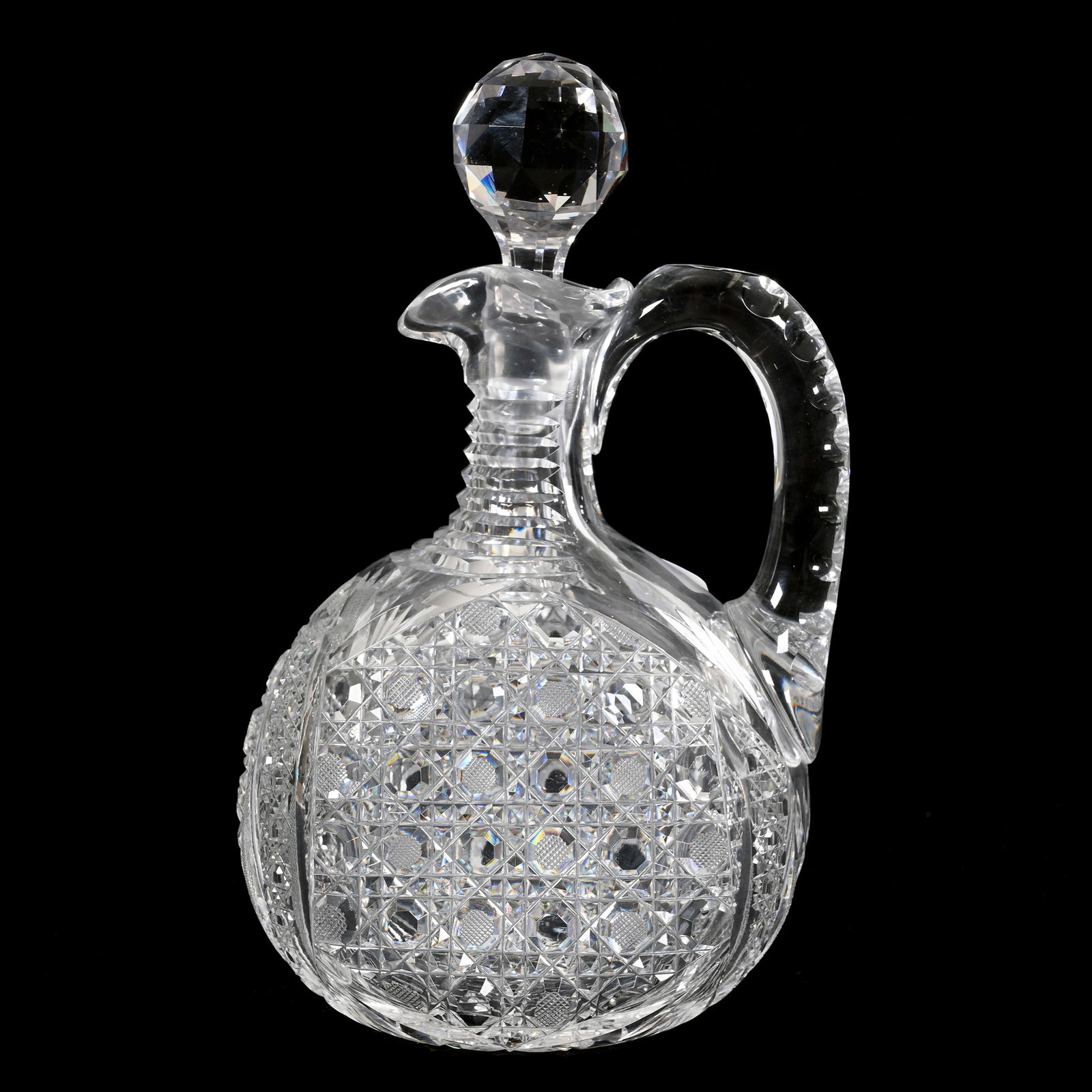 Ovoid Decanter, American Brilliant Cut Glass: Ovoid Decanter, American Brilliant Cut Glass, 10" x 6", Cane, Vesica, Hobstar, Strawberry Diamond And Fan Motif, Hobstar Base, Step Cut Neck, Double Notched Handle, Virginia Chaplin Collection, VA.