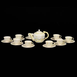 Tea Set, Ten Piece, Irish Belleek: Tea Set, Ten Piece, Irish Belleek, Shell And Coral Mold, Yellow Tint Highlights, (1) 6.25" x 10" Teapot, 13th Brown Mark, Sells With (9) Pattern Matched Cups And Saucers, 6th Green Mark, Texas Private