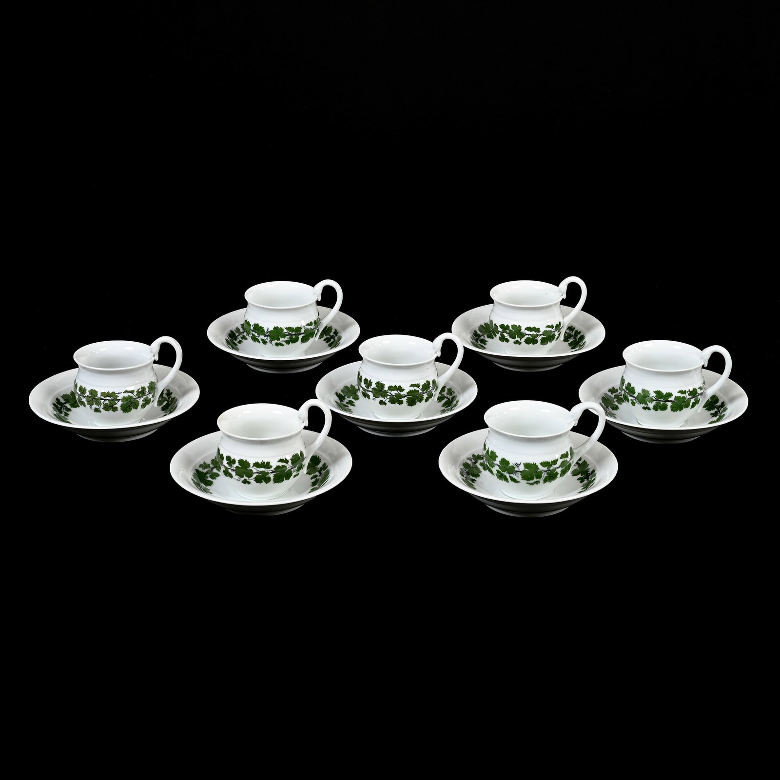 (7) Cups & Saucers, Meissen Blue Crossed Swords: (7) Cups & Saucers, Meissen Blue Crossed Swords, 3.5" x 5.75", Green Ivy Pattern, Circa 1930's, Double Slash Marks, One Cup Has Rim Repair, Denver, Colorado Private Collection.