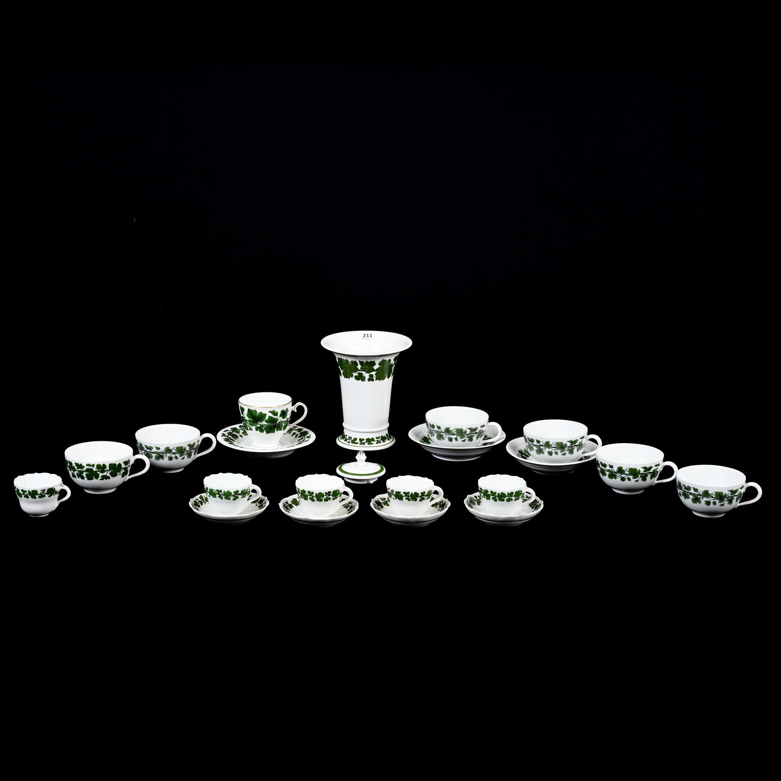 Assorted Meissen Blue Crossed Swords Items: Assorted Meissen Blue Crossed Swords Items, Green Ivy Pattern, Circa 1930's, (6) Coffee Cups, (1) 6.25" x 5.5" Vase, (4) Demitasse Cups And Saucers, Two Slash Marks On Cups & Saucers, Sells With An Ex