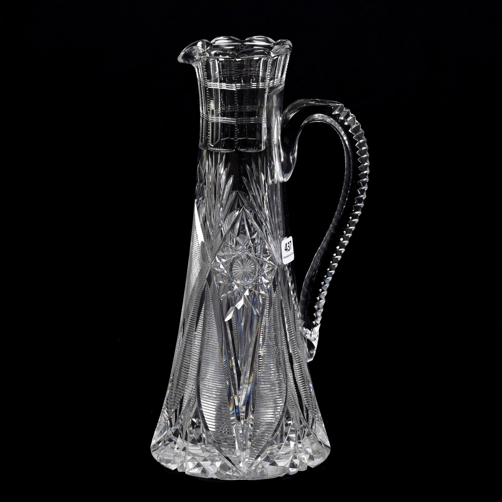 Claret Jug, American Brilliant Cut Glass, Imperial Pattern By Straus: Claret Jug, American Brilliant Cut Glass, Imperial Pattern By Straus, 12" x 6", Beautiful Long Notched Handle, Hobstar Base, Crack At Lower Handle Attach Point. The Seller Of This Item Has Elected To 