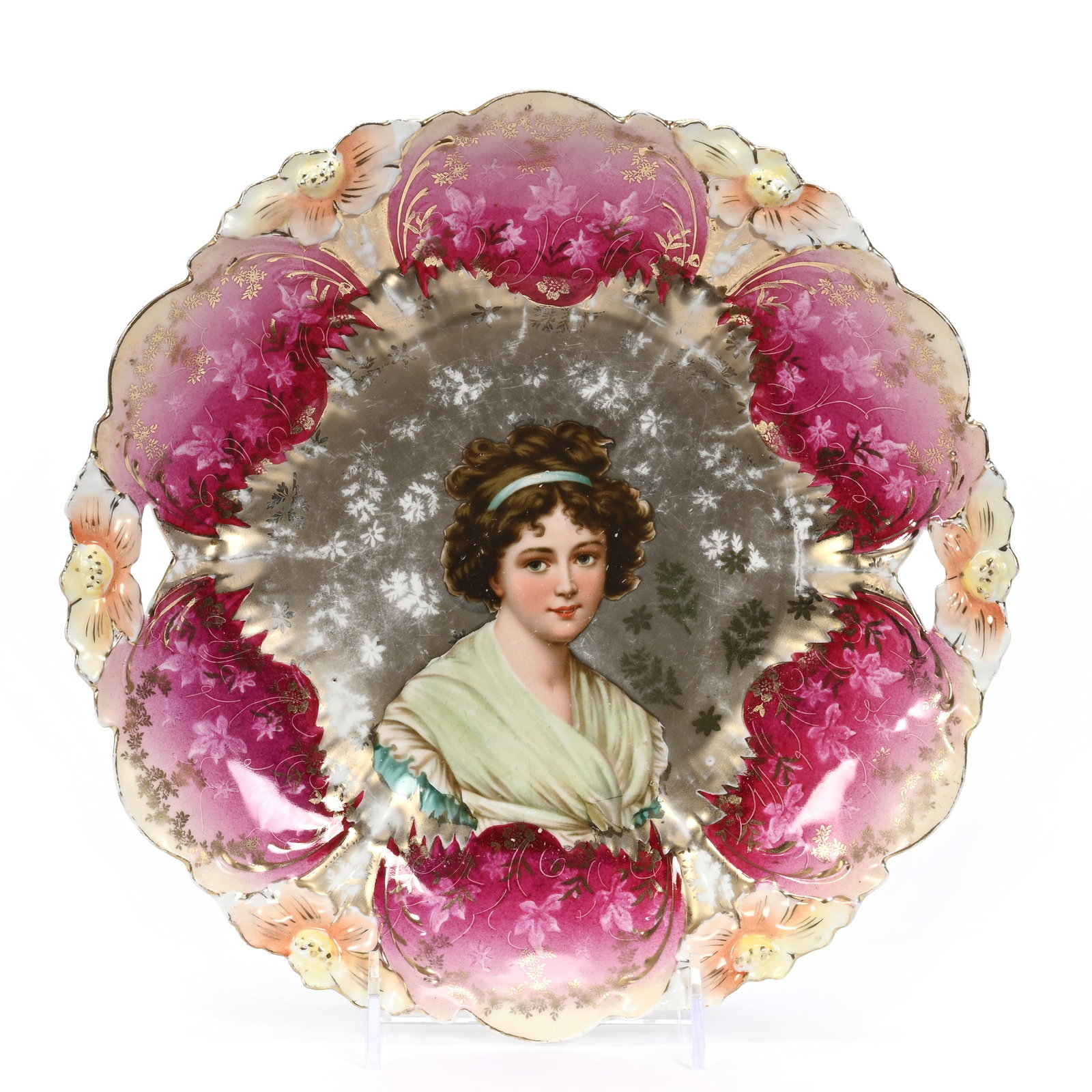 Cake Plate, Unmarked R.S. Prussia: Cake Plate, Unmarked R.S. Prussia, 11", Lily Mold, Lebrun With Ribbon, Gold Background, Pink Border, Some Gold Wear, Sizable Surface Rim Chip On Exterior, Virginia Private Collection.