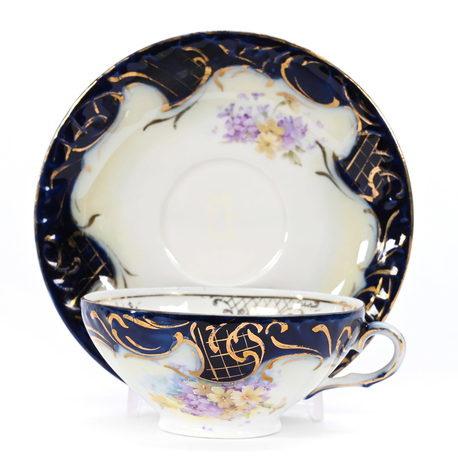 Coffee Cup/Saucer, Unmarked R.S. Prussia: Coffee Cup/Saucer, Unmarked R.S. Prussia, 2" x 5.5", Cobalt Blue, Yellow And White Tones, Floral Decor, Gold Stencil Highlights, Lee & Carol Marple Collection.