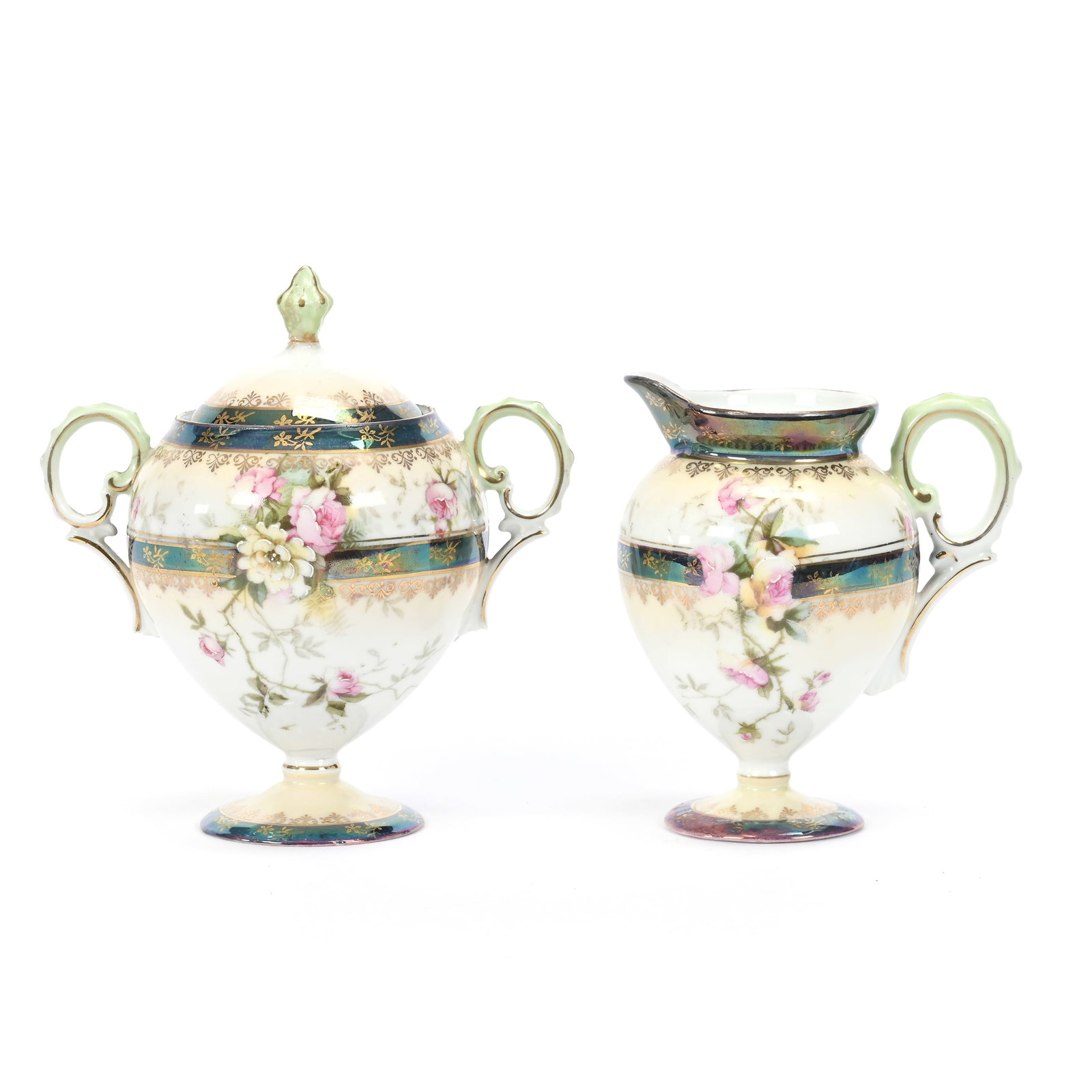 Pedestal Creamer & Sugar Set, Unmarked R.S. Prussia: Pedestal Creamer & Sugar Set, Unmarked R.S. Prussia, 5.75" x 5", White And Cream, Iridized Tiffany Bands, Floral Decor, Gold Stencil Highlights, Finial Repair On Sugar, Lee & Carol Marple Collection.
